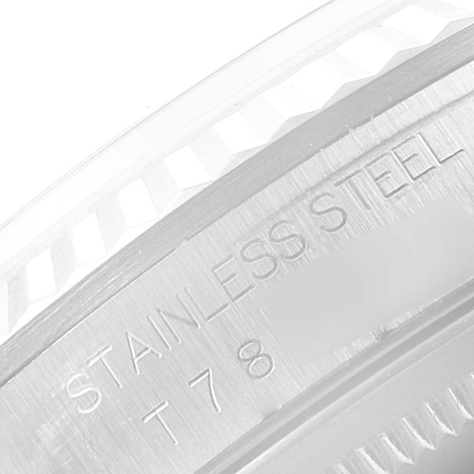 This image shows a close-up of the stainless steel part of a Rolex Datejust 16234 Men's Stainless Steel Silver Dial 16234 Men's Stainless Steel Silver Dial watch, focusing on its engraved details.