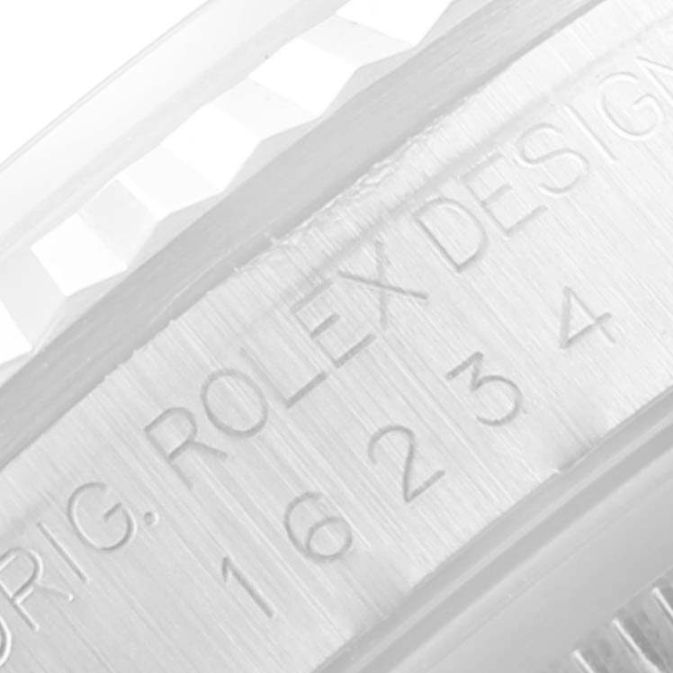 The image shows a close-up of the case side with the engravings on a Rolex Datejust 16234 Men's Stainless Steel Silver Dial 16234 Men's Stainless Steel Silver Dial model.