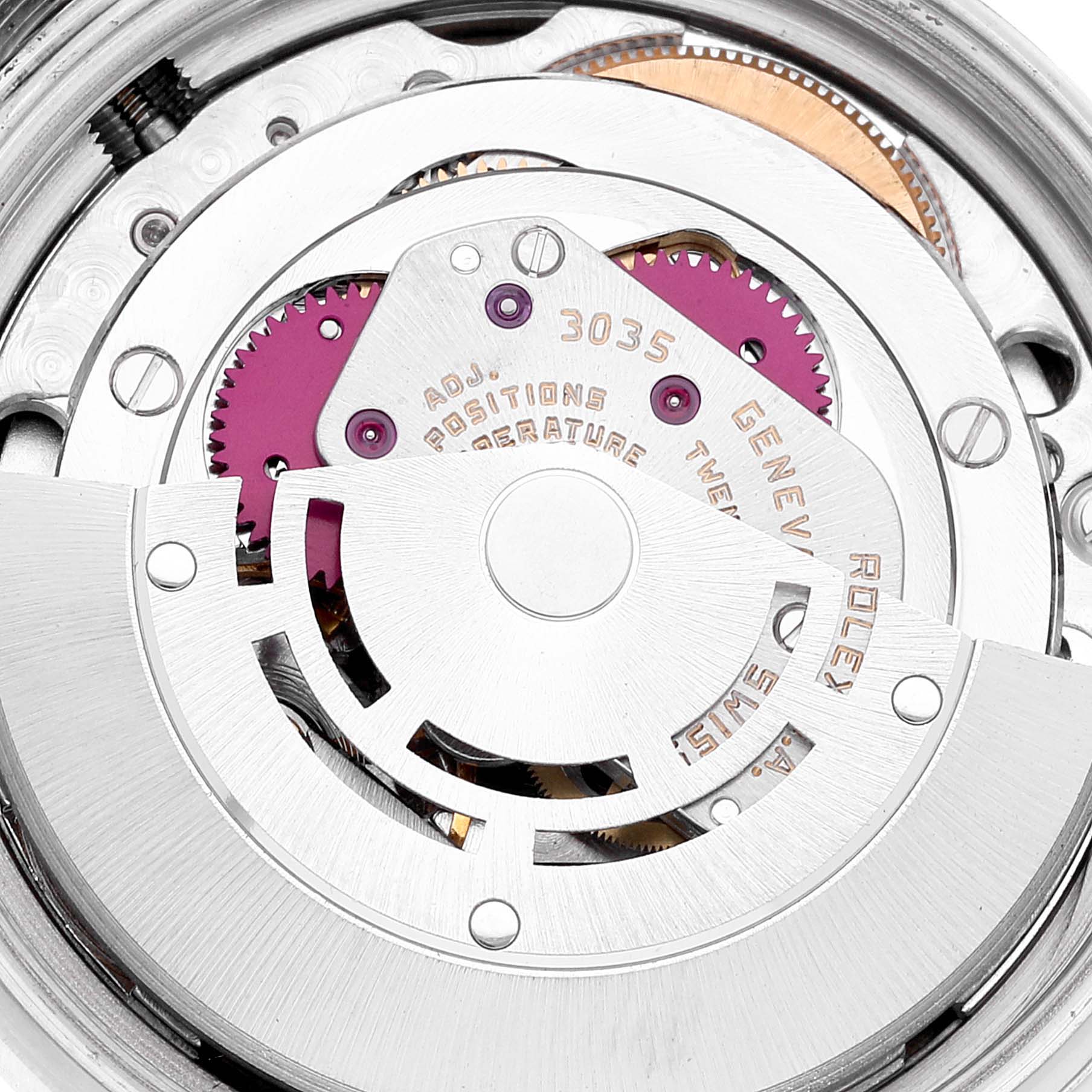 This image shows a close-up view of the Rolex Datejust 16014 Men's Stainless Steel Silver Dial 16014 Men's Stainless Steel Silver Dial's movement mechanism, showcasing its intricate inner components.