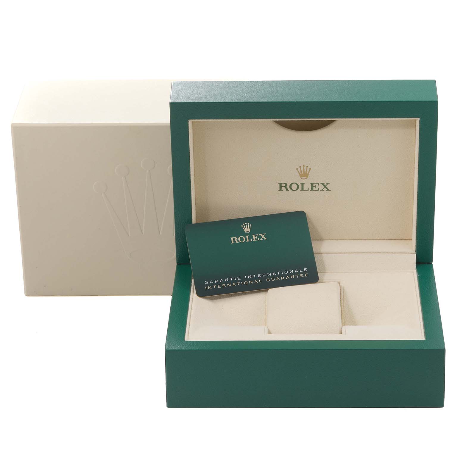 The image shows an opened Rolex Datejust 126234 Men's Stainless Steel White Dial 126234 Men's Stainless Steel White Dial watch box and an international guarantee card placed inside.