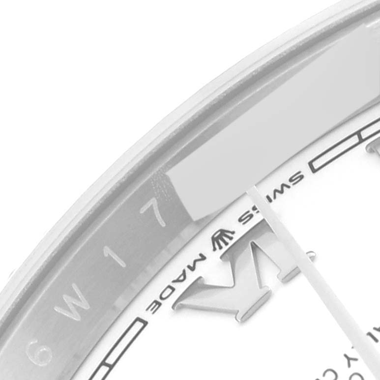 The image shows a close-up of the dial and rehaut of a Rolex Datejust 126234 Men's Stainless Steel White Dial 126234 Men's Stainless Steel White Dial watch, highlighting the Swiss Made inscription and part of the crown logo.