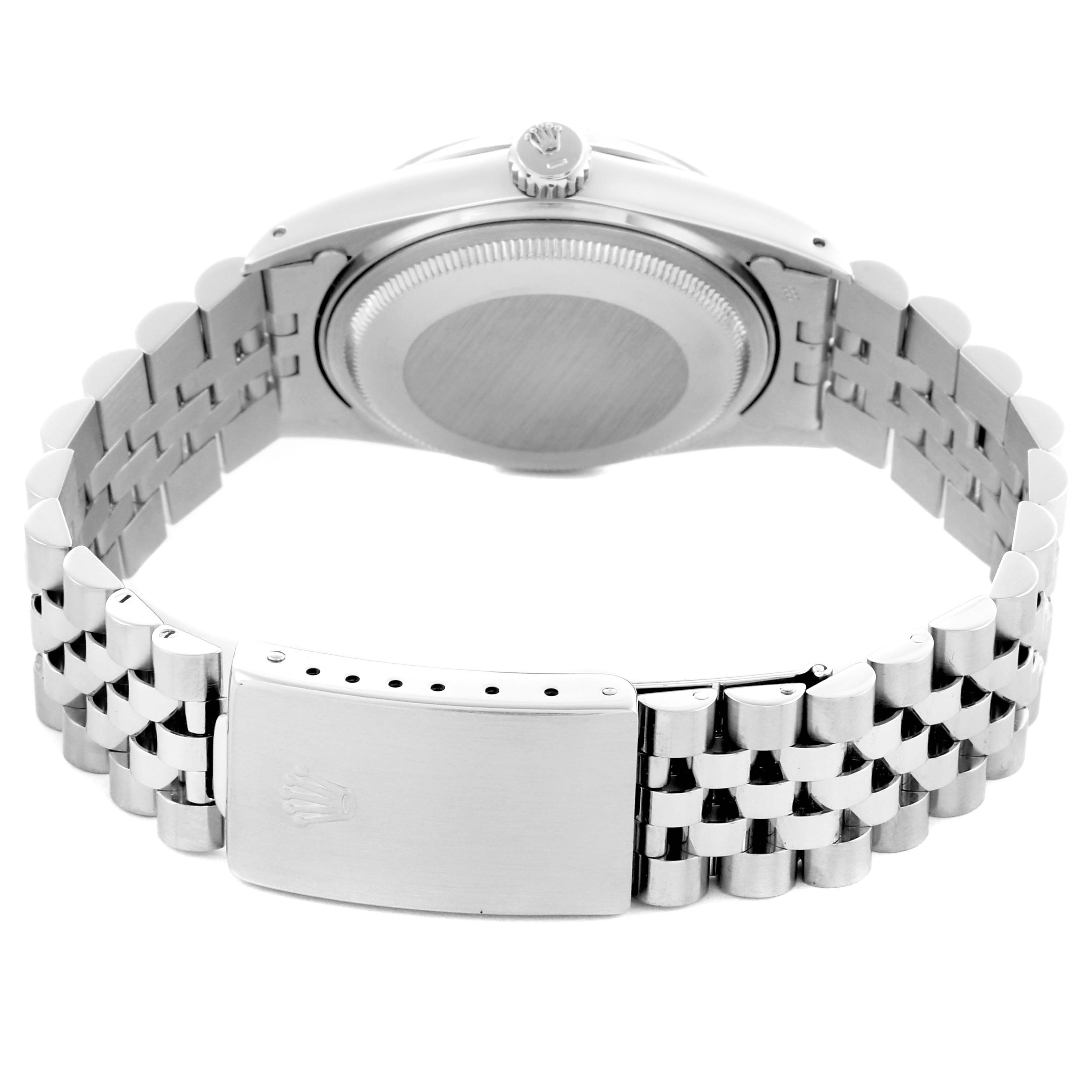 The Rolex Datejust 16014 Men
s Stainless Steel White Dial 16014 Men
s Stainless Steel White Dial watch is shown from the back, highlighting the clasp, bracelet, and caseback.