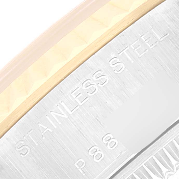 Close-up of the stainless steel case back of a Rolex Datejust 79173 Women's Steel and Gold (two tone) Black Dial 79173 Women's Steel and Gold (two tone) Black Dial, showing "STAINLESS STEEL" engraving.