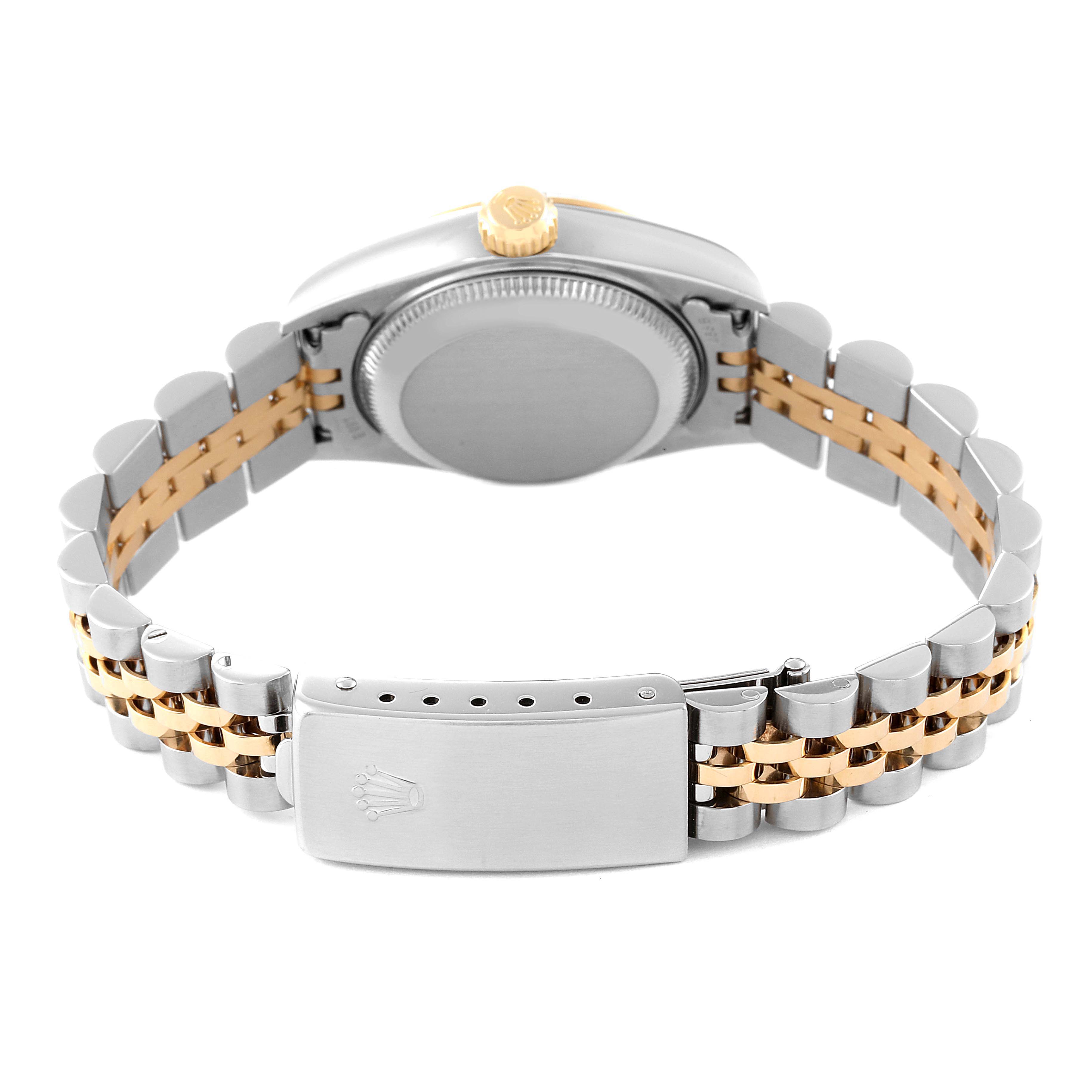 The image shows the back case and clasp of a Rolex Datejust 79173 Women's Steel and Gold (two tone) Black Dial 79173 Women's Steel and Gold (two tone) Black Dial watch, featuring a two-tone bracelet with gold and silver links.