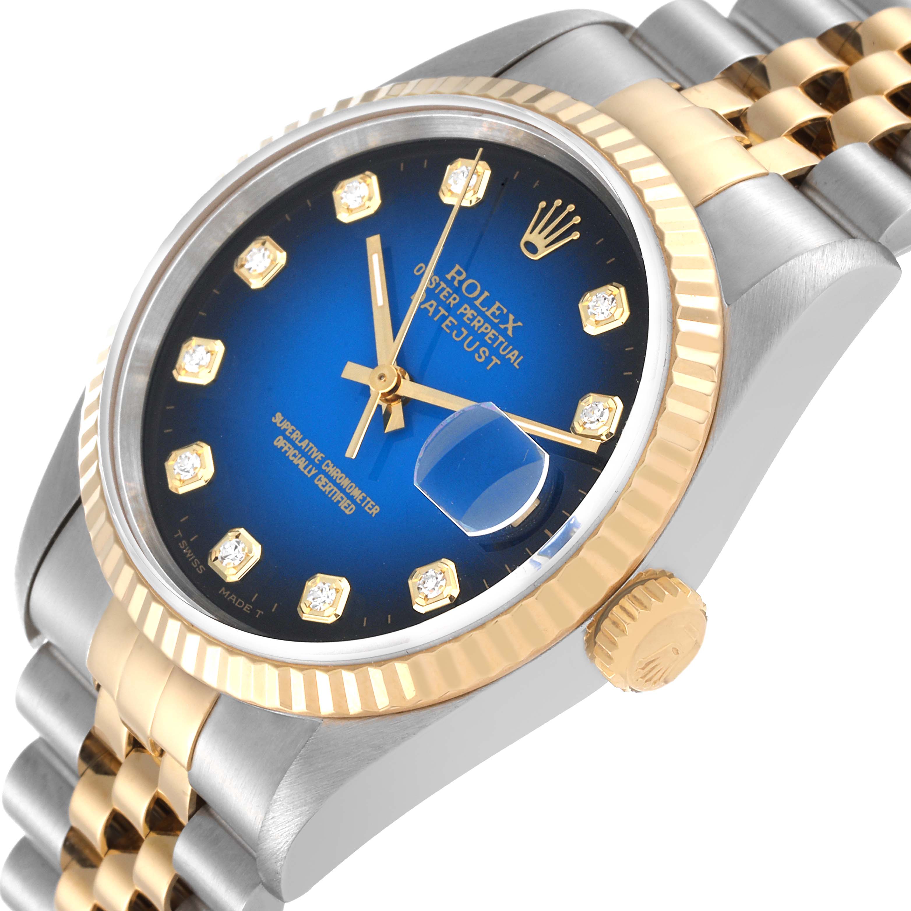 The image shows a Rolex Datejust 16233 Men's Steel and Gold (two tone) Blue Dial 16233 Men's Steel and Gold (two tone) Blue Dial watch at an angled view, highlighting the blue dial, gold fluted bezel, and two-tone bracelet.