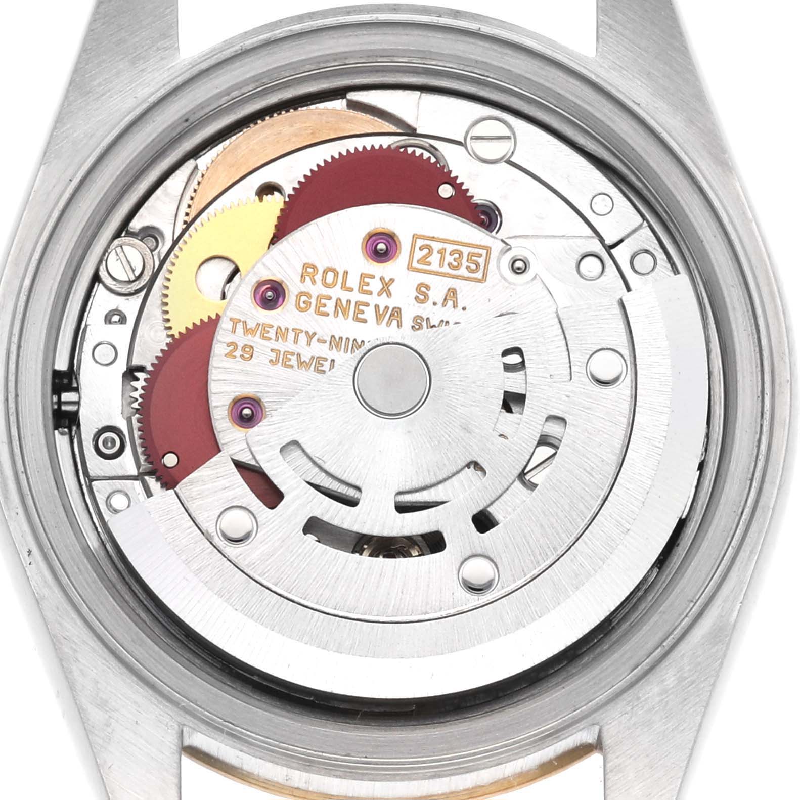 The image shows the movement of a Rolex Datejust 69173 Women's Steel and Gold (two tone) Champagne Dial 69173 Women's Steel and Gold (two tone) Champagne Dial watch from a top-down angle, highlighting the internal gears and components.