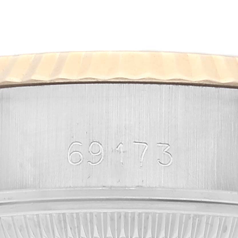 This image shows a close-up of the serial number "69173" on the side casing of a Rolex Datejust 69173 Women's Steel and Gold (two tone) Champagne Dial 69173 Women's Steel and Gold (two tone) Champagne Dial watch.