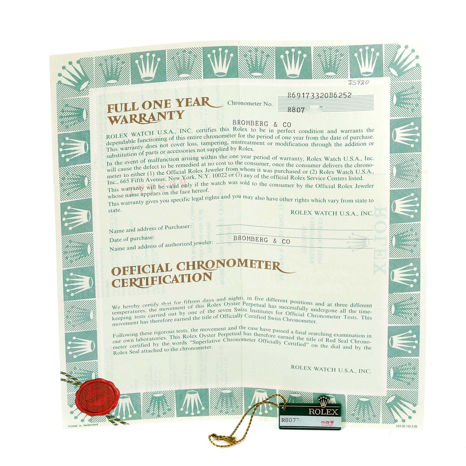 The image shows warranty paperwork and certification for a Rolex Datejust 69173 Women's Steel and Gold (two tone) Champagne Dial 69173 Women's Steel and Gold (two tone) Champagne Dial watch, along with a Rolex tag.