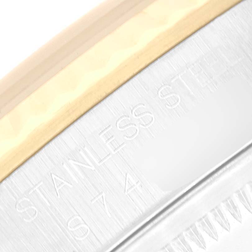 The image shows a close-up of the bezel and inner rim engraving of a Rolex Datejust 16233 Men's Steel and Gold (two tone) Champagne Dial 16233 Men's Steel and Gold (two tone) Champagne Dial watch.