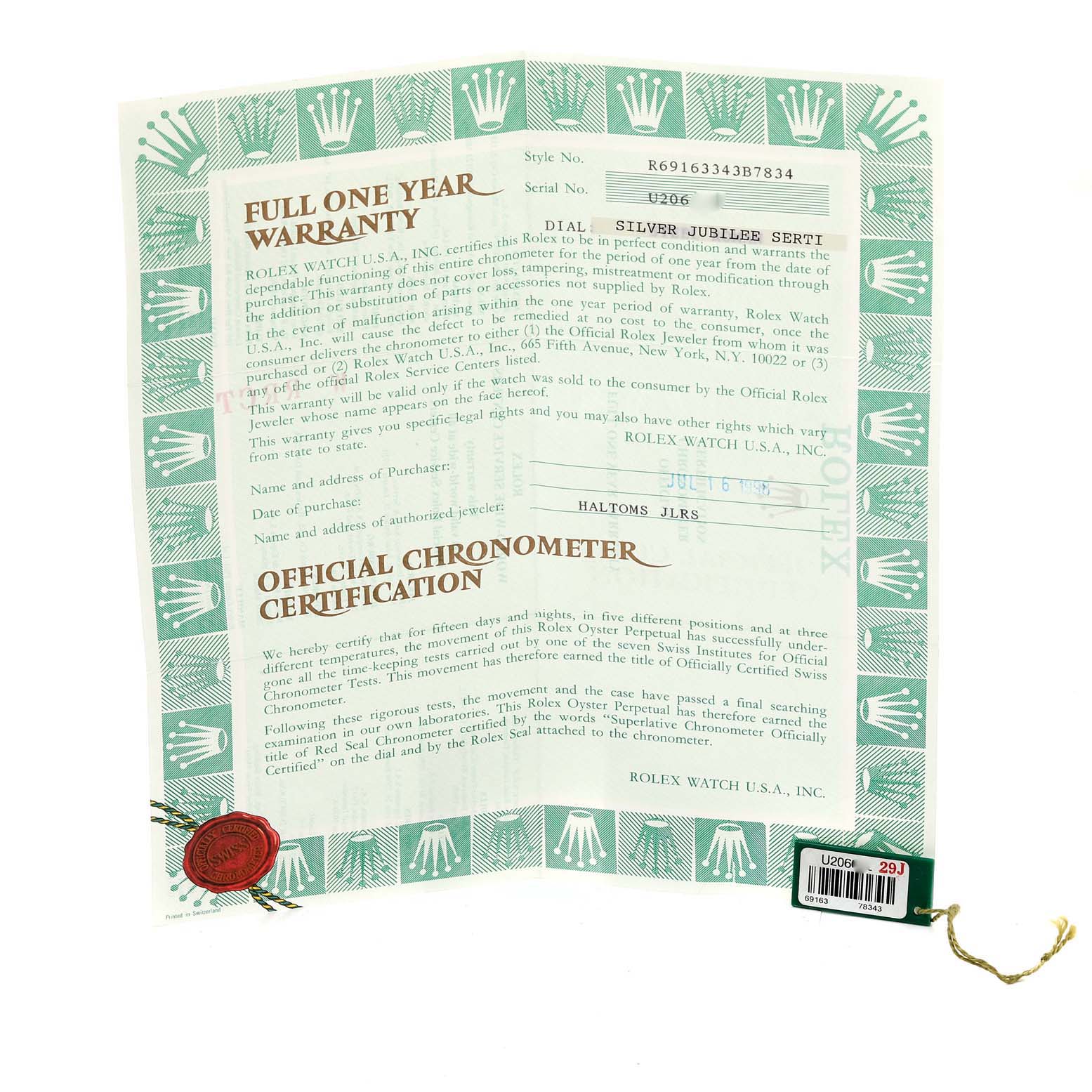 The image shows a warranty and certification papers for the Rolex Datejust 69163 Women's Steel and Gold (two tone) Silver Dial 69163 Women's Steel and Gold (two tone) Silver Dial model, along with a tag attached by a string.