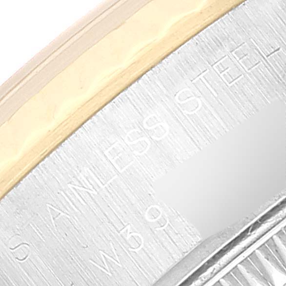 This image shows the detailed engraving on the stainless steel part of the Rolex Datejust 69173 Women's Steel and Gold (two tone) Beige Dial 69173 Women's Steel and Gold (two tone) Beige Dial watch case.