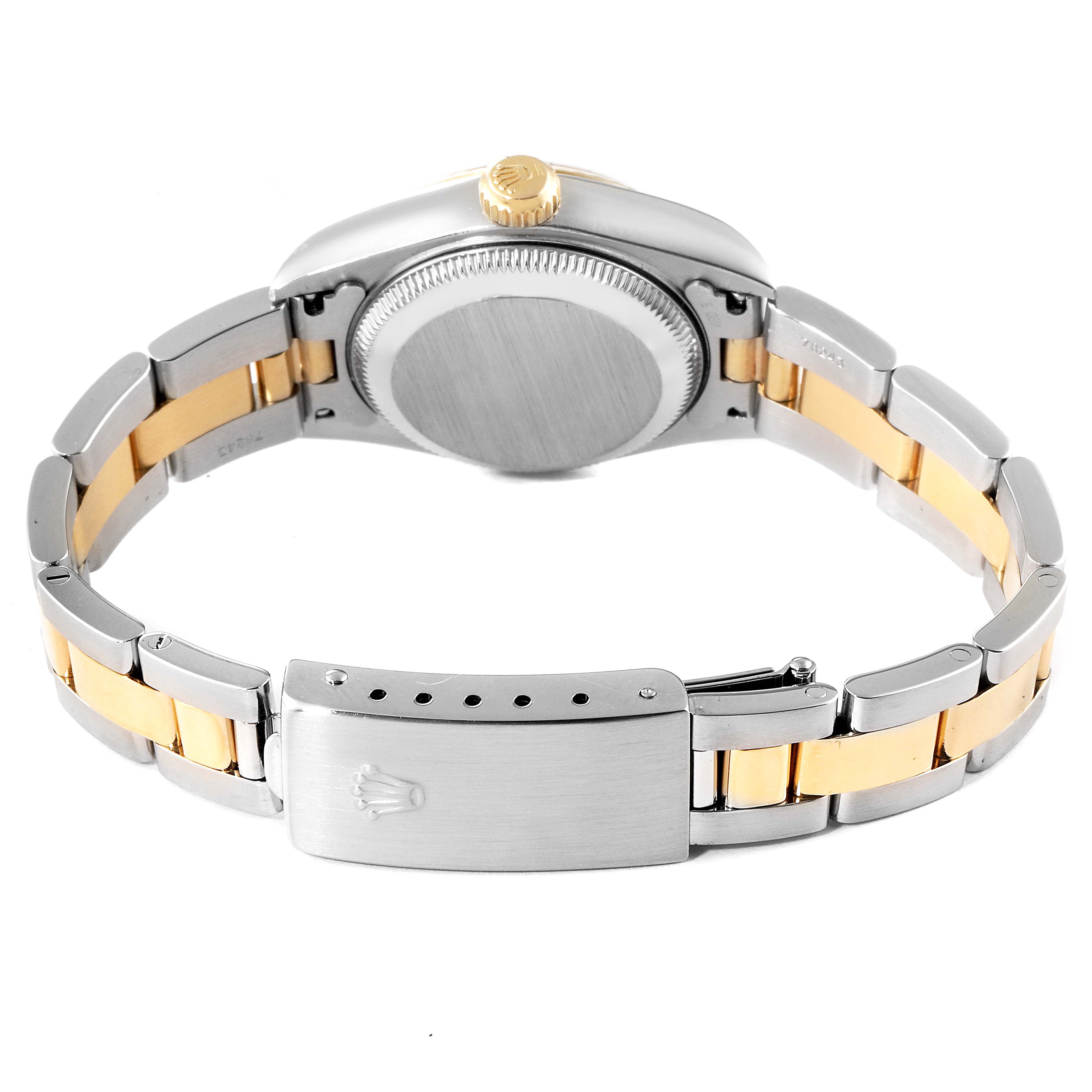 This image shows the back case and bracelet of a Rolex Datejust 79173 Women's Steel and Gold (two tone) Silver Dial 79173 Women's Steel and Gold (two tone) Silver Dial watch, featuring a two-tone metal clasp and links.