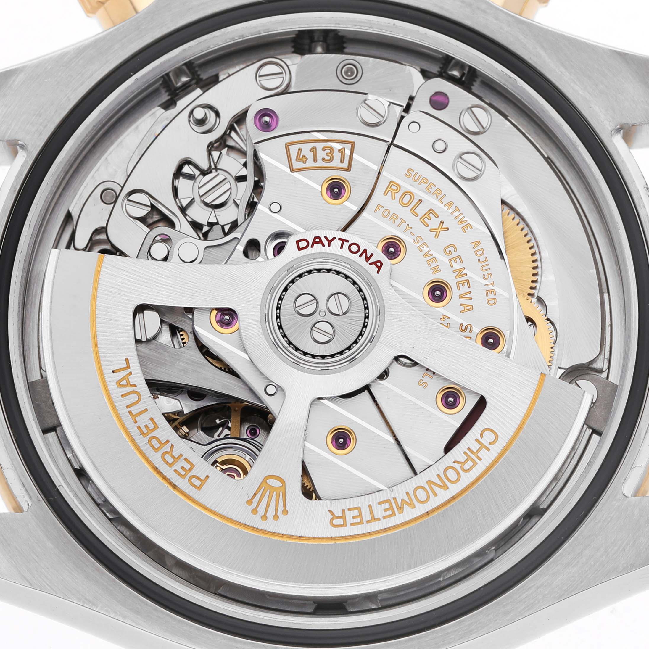 The image shows the movement mechanism of a Rolex Daytona 126503 Men's Steel and Gold (two tone) Black Dial watch from the back, highlighting its intricate components.