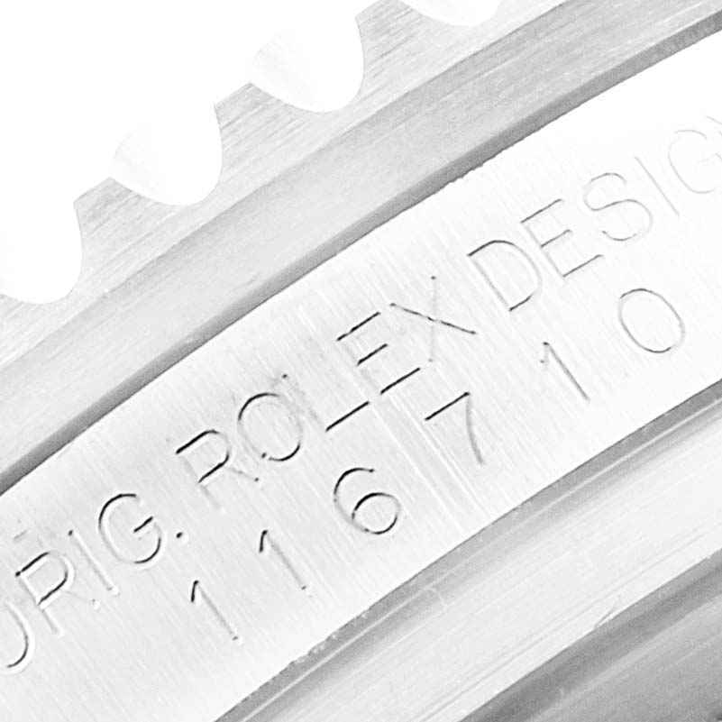 The image shows a close-up of the bezel and the engraved model number of a Rolex GMT-Master 116710 Men
s Stainless Steel Black Dial 116710 Men
s Stainless Steel Black Dial.