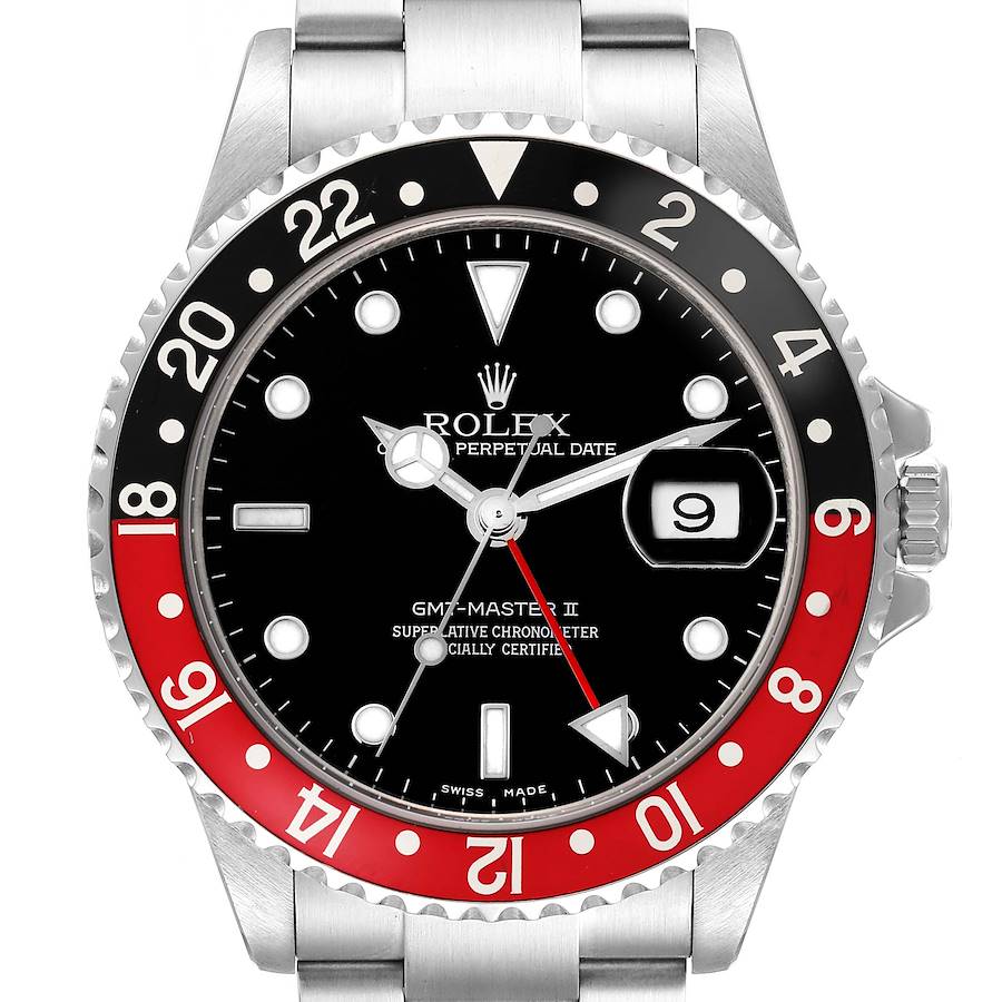 The Rolex GMT-Master watch is shown from a front angle, displaying the dial, bezel, and part of the bracelet.