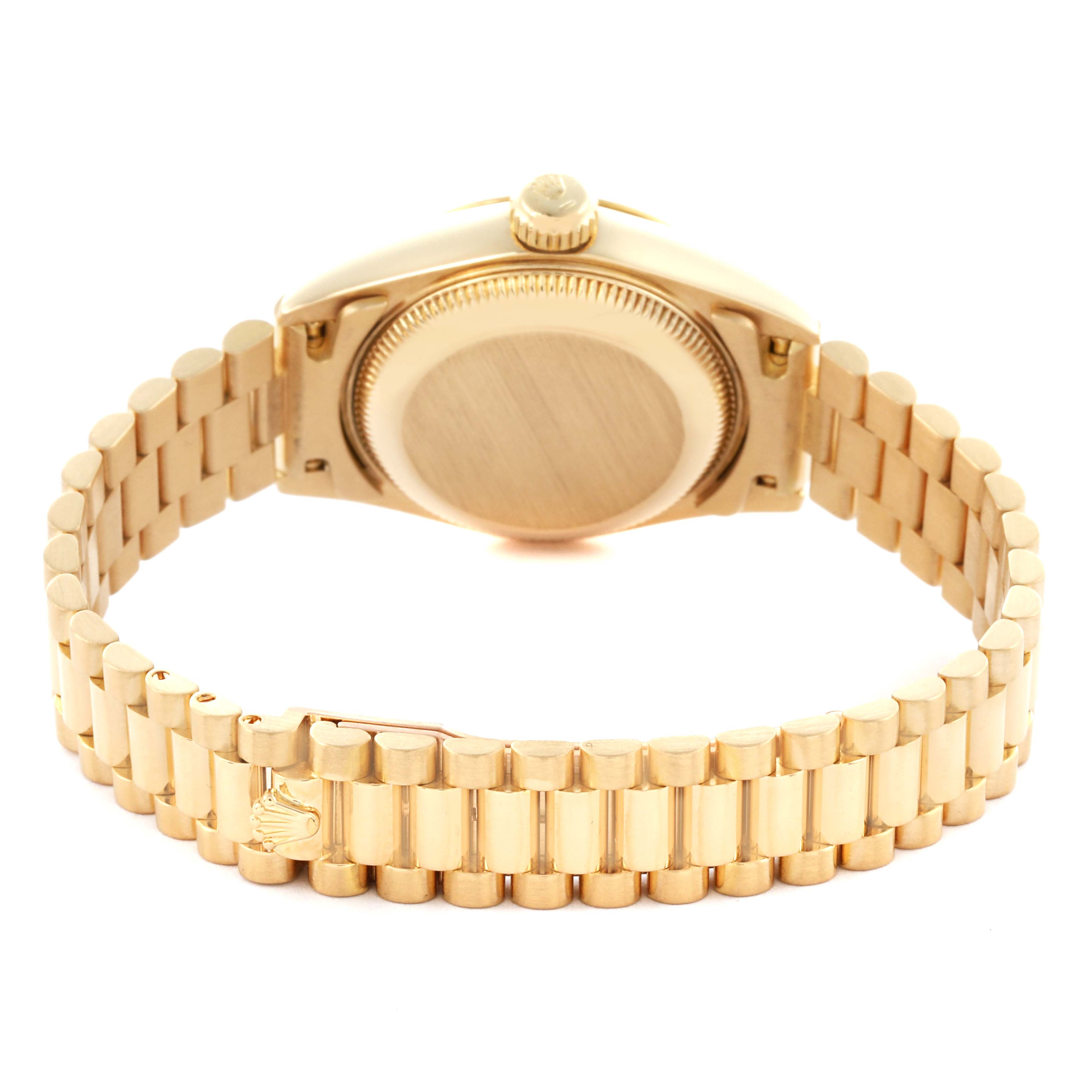 The image shows a Rolex President 69178 Women's Yellow Gold White Dial 69178 Women's Yellow Gold White Dial model watch from the back, highlighting the case back and gold bracelet with a clasp.