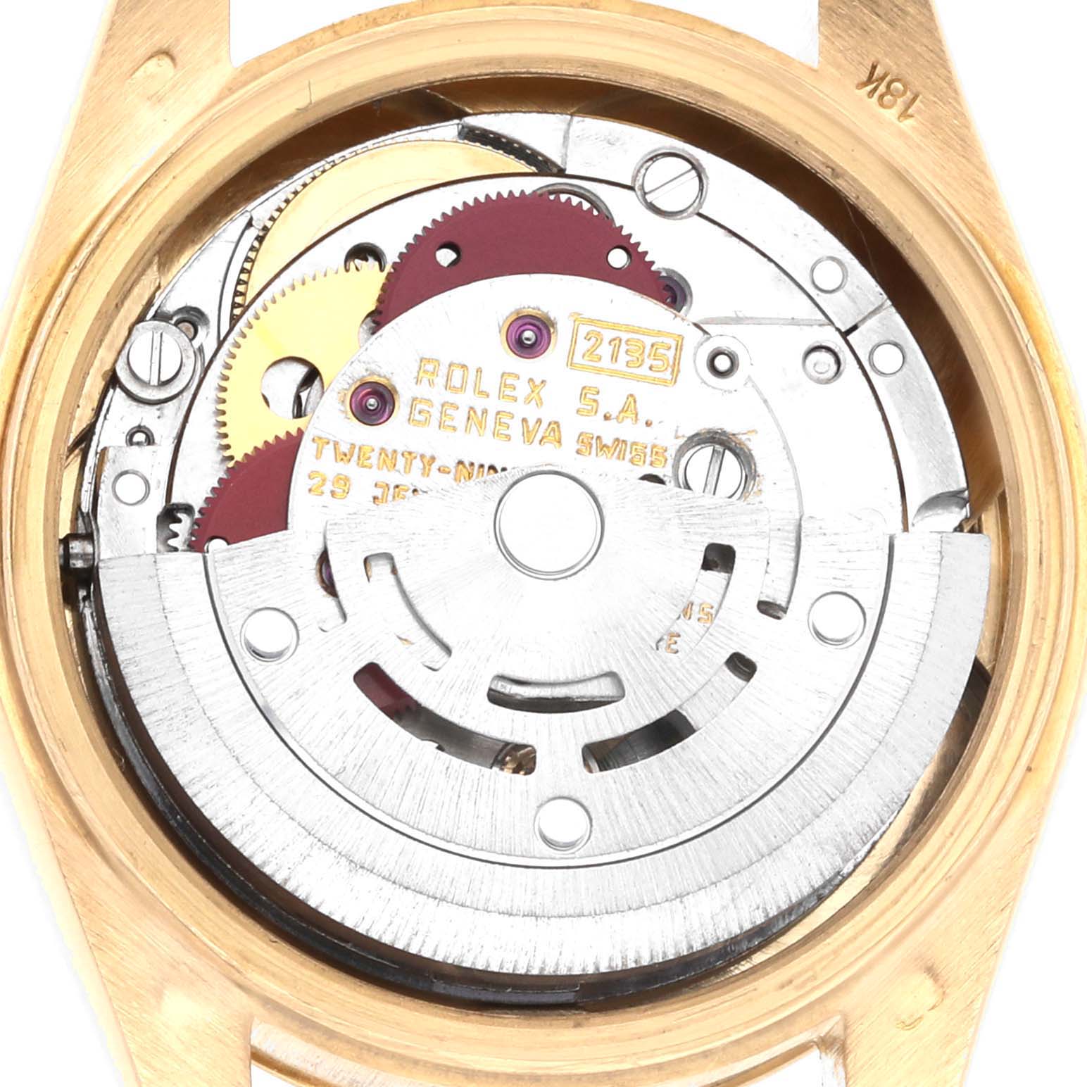 The image shows the movement of a Rolex President 69178 Women's Yellow Gold White Dial 69178 Women's Yellow Gold White Dial model watch viewed from the back, highlighting the rotor and gears.