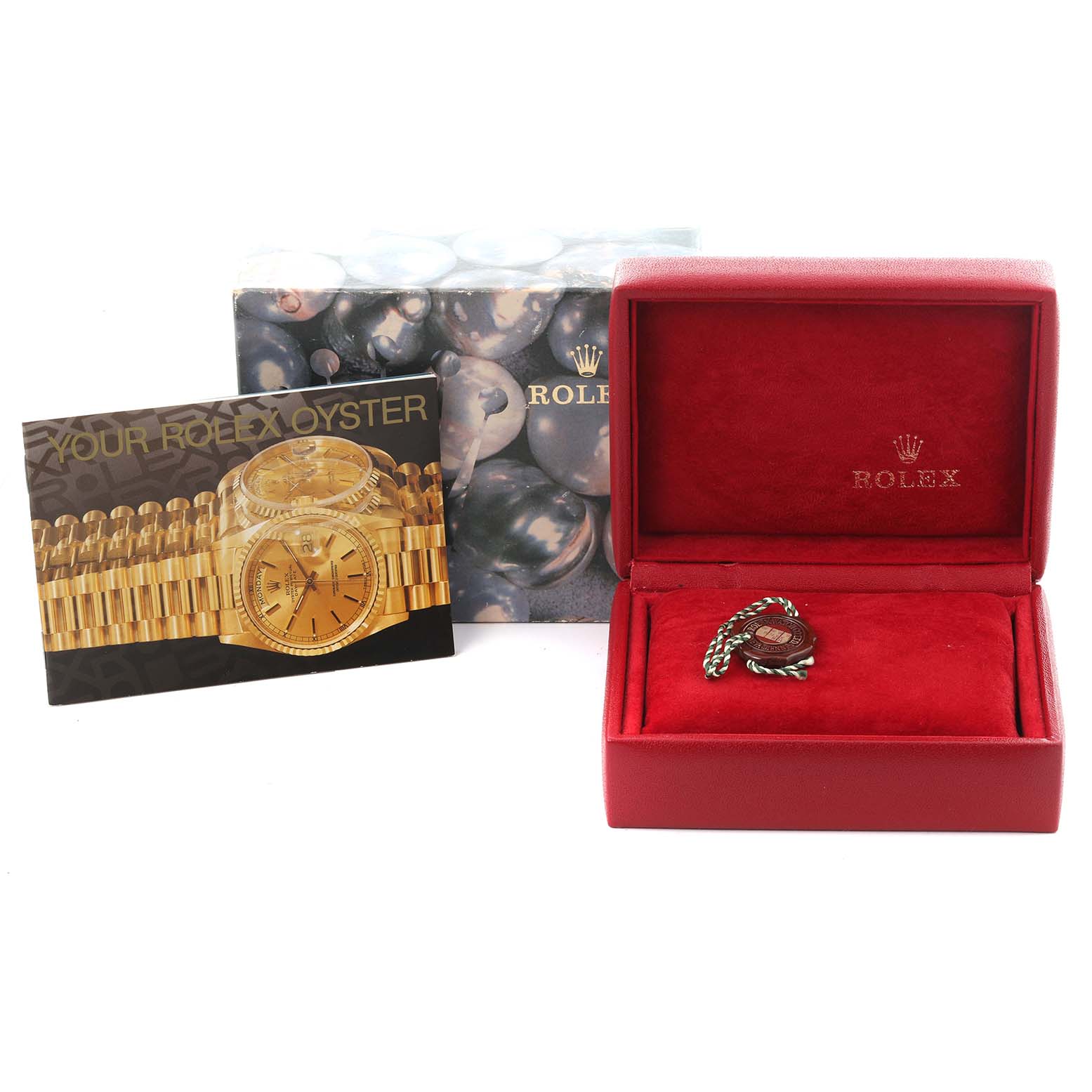 The image shows a Rolex President 69178 Women's Yellow Gold White Dial 69178 Women's Yellow Gold White Dial model box with accessories, a booklet, and packaging from a front angle.