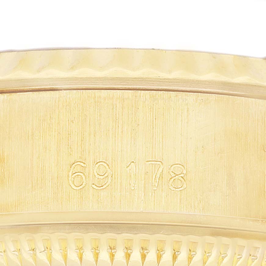 The image shows a close-up of the case side and bezel of a Rolex Datejust 69178 Women's Yellow Gold Champagne Dial, highlighting the model number engraving.