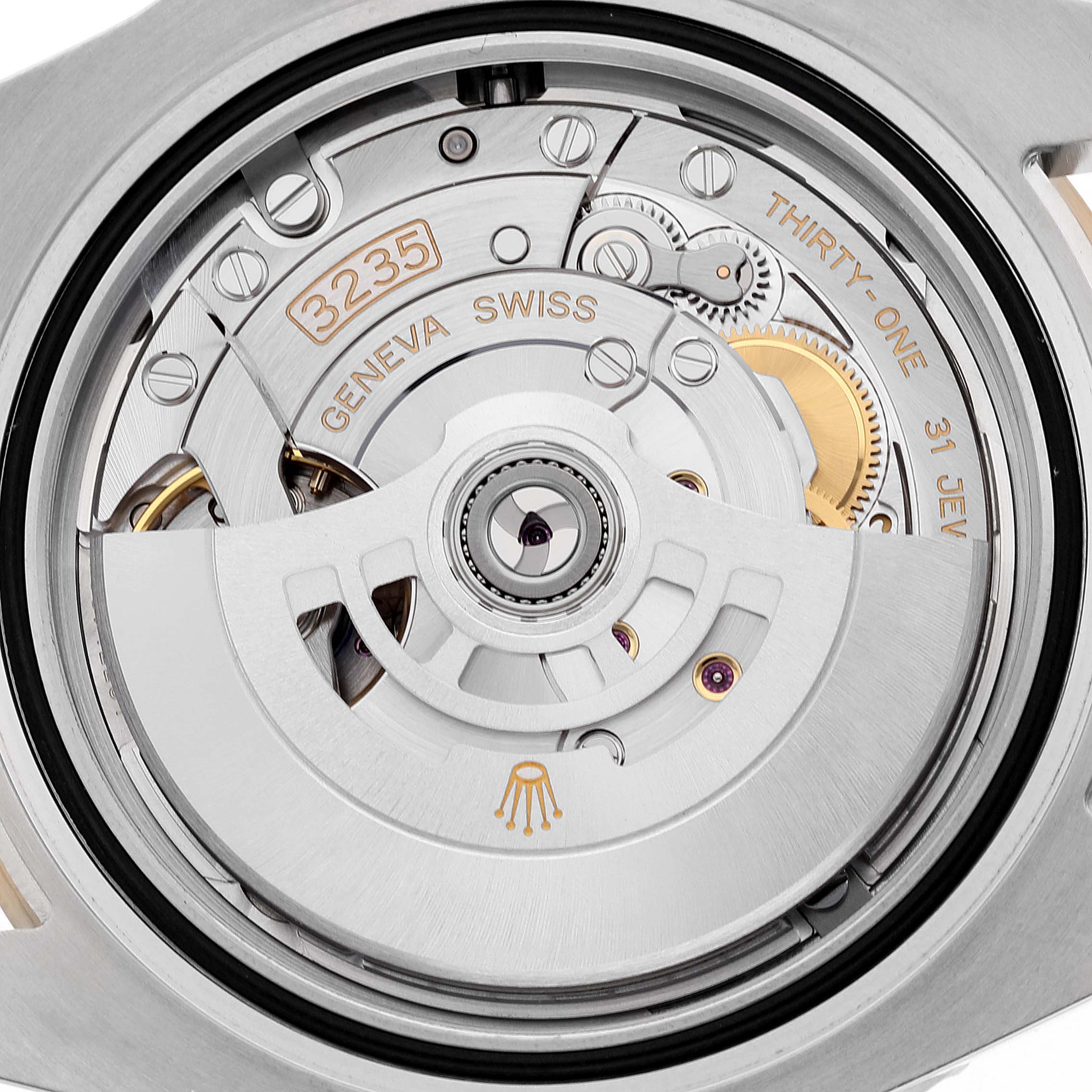 The image shows a close-up of the inner movement mechanism of a Rolex Submariner 126613LB Men's Steel and Gold (two tone) Blue Dial 126613LB Men's Steel and Gold (two tone) Blue Dial watch, highlighting gears and inscriptions.