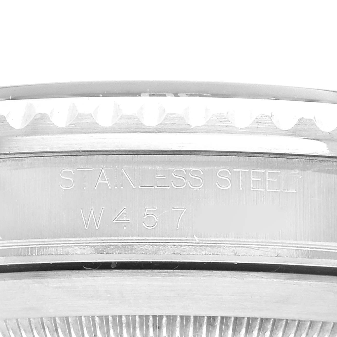 This image shows a close-up of the side engraving on a Rolex Submariner 16610 Men
s Stainless Steel Black Dial 16610 Men
s Stainless Steel Black Dial watch, highlighting the "STAINLESS STEEL" text and model number.