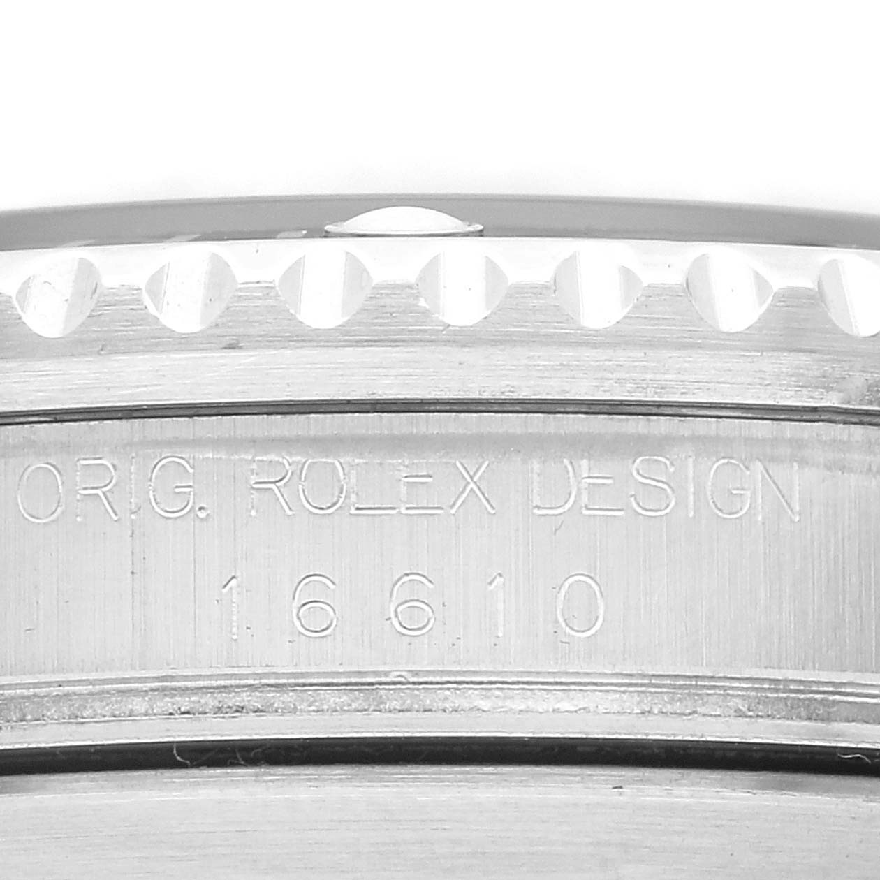 This image shows a close-up of the side of the Rolex Submariner 16610 Men
s Stainless Steel Black Dial 16610 Men
s Stainless Steel Black Dial watch case, highlighting the bezel and engraved model number 16610.