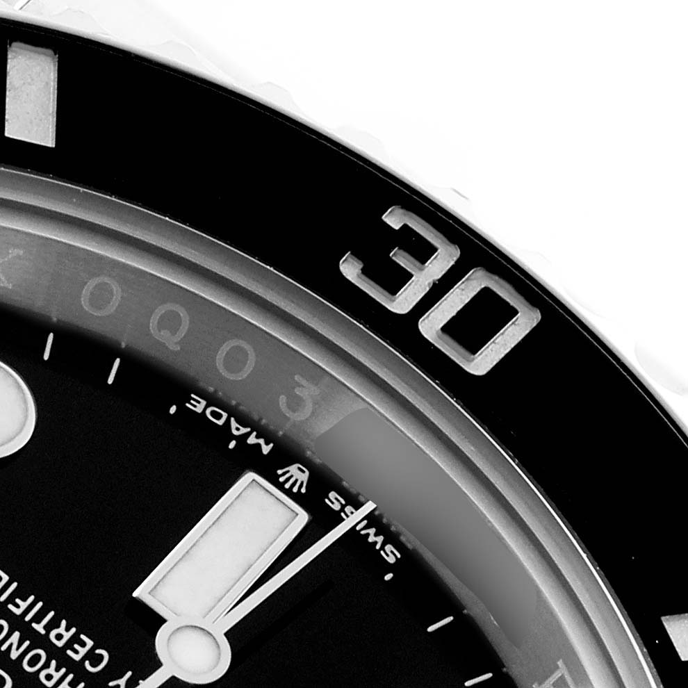 The image shows a close-up of the bezel and part of the dial of a Rolex Submariner 126610LN Men's Stainless Steel Black Dial, focusing on the "30" marking.
