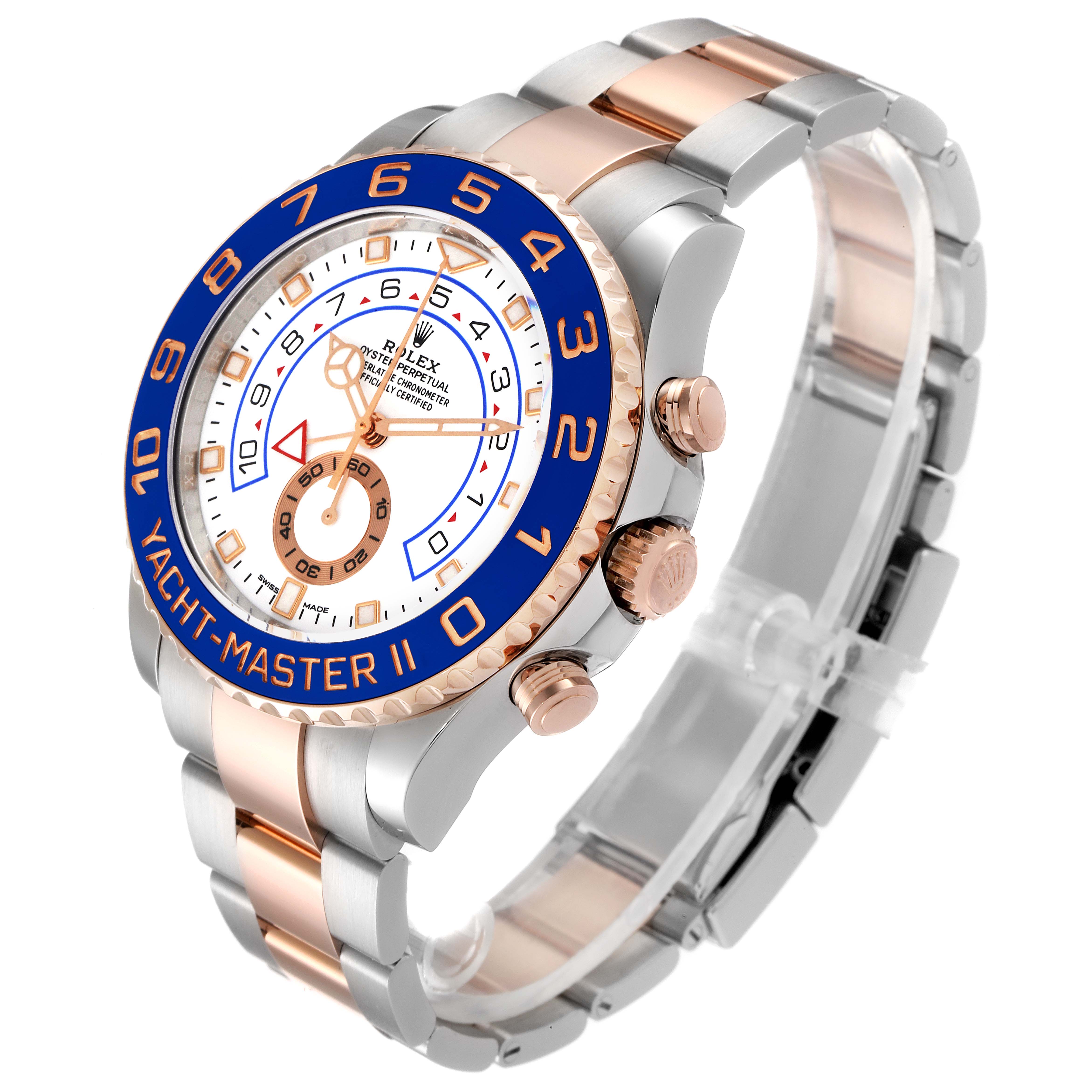 The Rolex Yacht-Master 116681 Men
s Steel and Gold (two tone) White Dial 116681 Men
s Steel and Gold (two tone) White Dial watch is shown from an angled top-side view, highlighting the face, bezel, and bracelet.