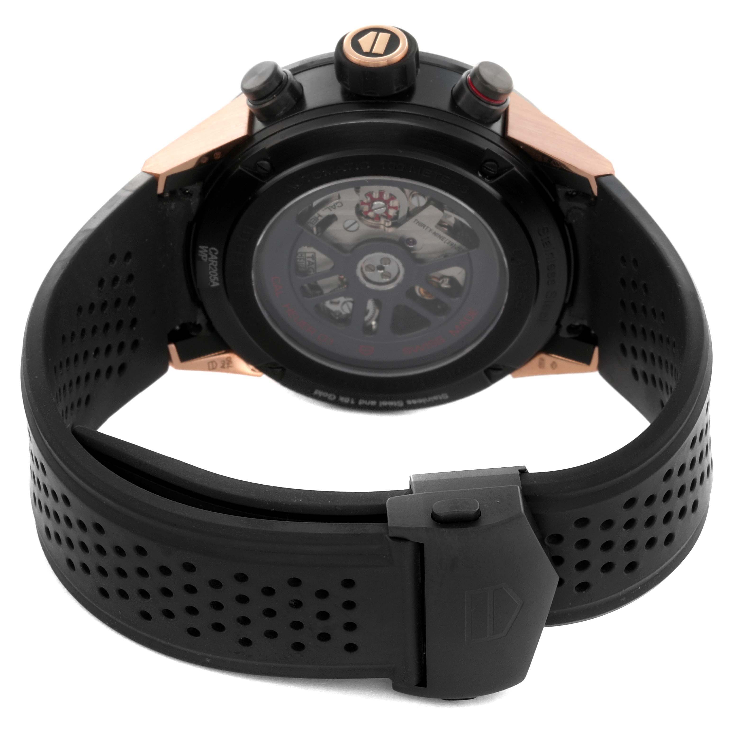 The image shows the back of the Tag Heuer Carrera CAR205A.FT6087 Men's Stainless Steel Transparent Dial CAR205A.FT6087 Men's Stainless Steel Transparent Dial watch, highlighting its movement and perforated strap.