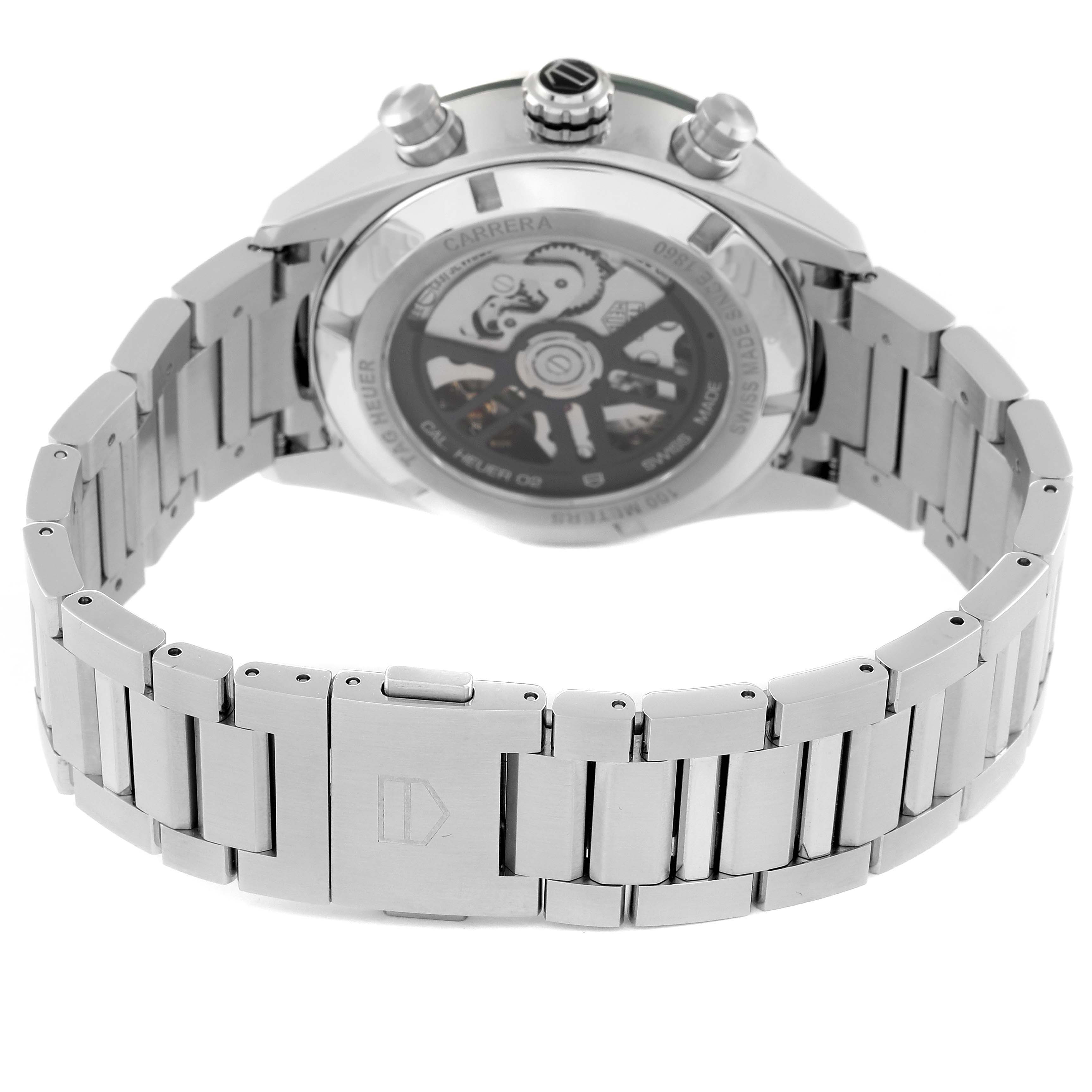 The image shows the back of a Tag Heuer Carrera CBN2A1N.BA0643 Men's Stainless Steel Green Dial CBN2A1N.BA0643 Men's Stainless Steel Green Dial watch, highlighting its stainless steel bracelet and visible movement through the case back.