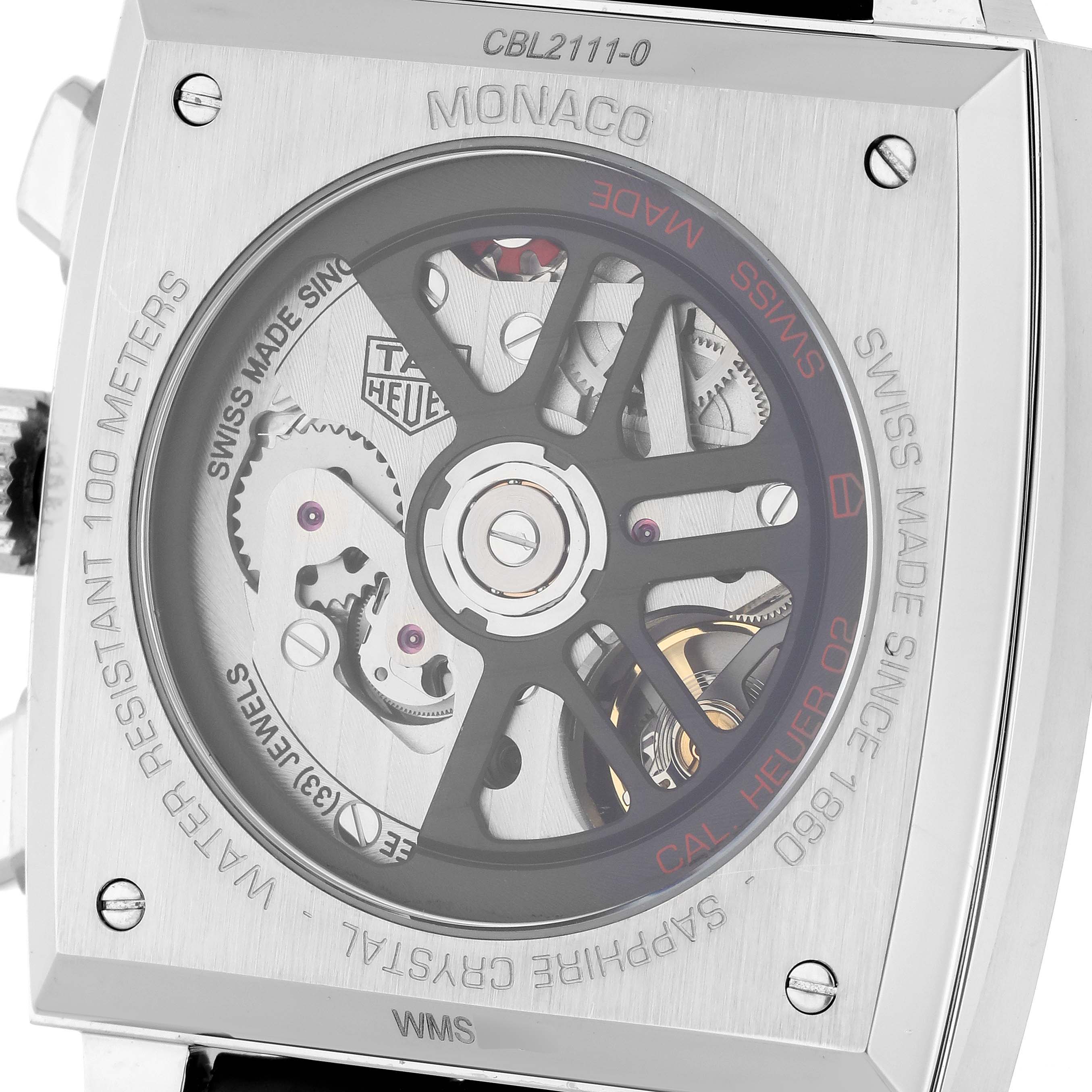 The image shows the back of a Tag Heuer Monaco CBL2111.FC6453 Men's Stainless Steel Blue Dial CBL2111.FC6453 Men's Stainless Steel Blue Dial watch, highlighting its movement and sapphire crystal case back.