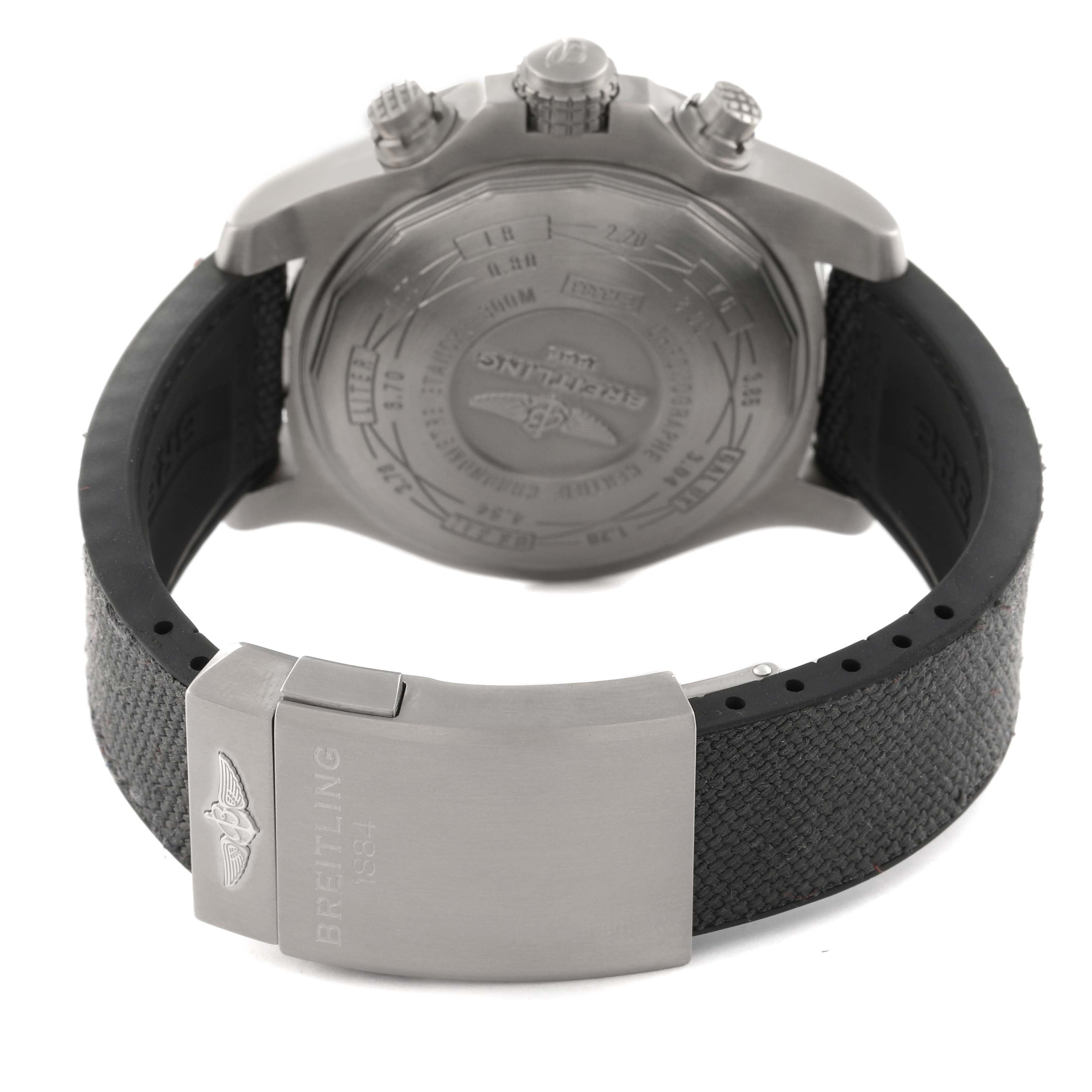 The image shows the back view of the Breitling Avenger E13383 Men's Titanium Grey Dial E13383 Men's Titanium Grey Dial watch, focusing on the case back, crown, and clasp of the strap.