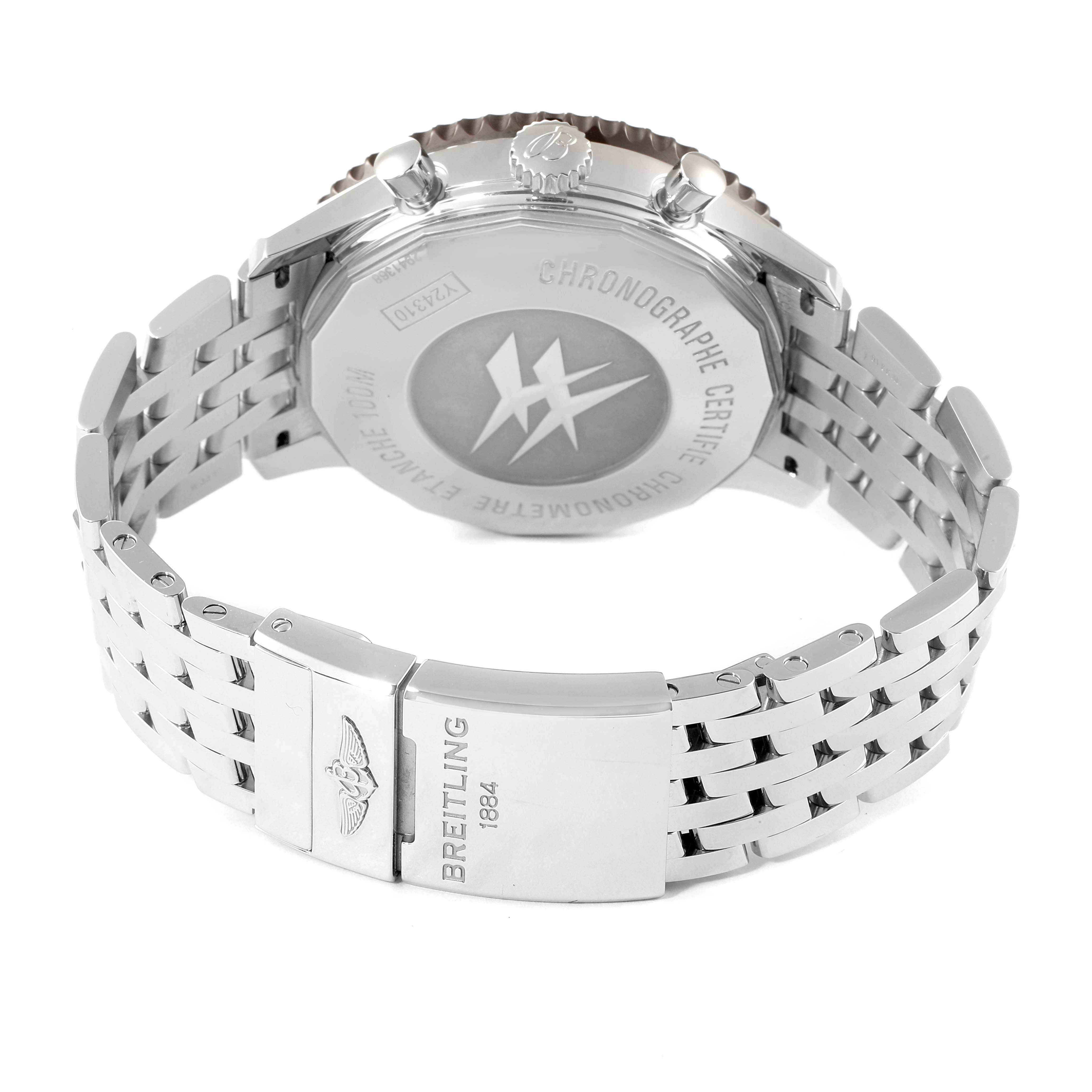 The image shows the back and clasp of a Breitling Chronoliner Y24310 Men's Stainless Steel Brown Dial Y24310 Men's Stainless Steel Brown Dial watch, highlighting its stainless steel bracelet and engraved case back.
