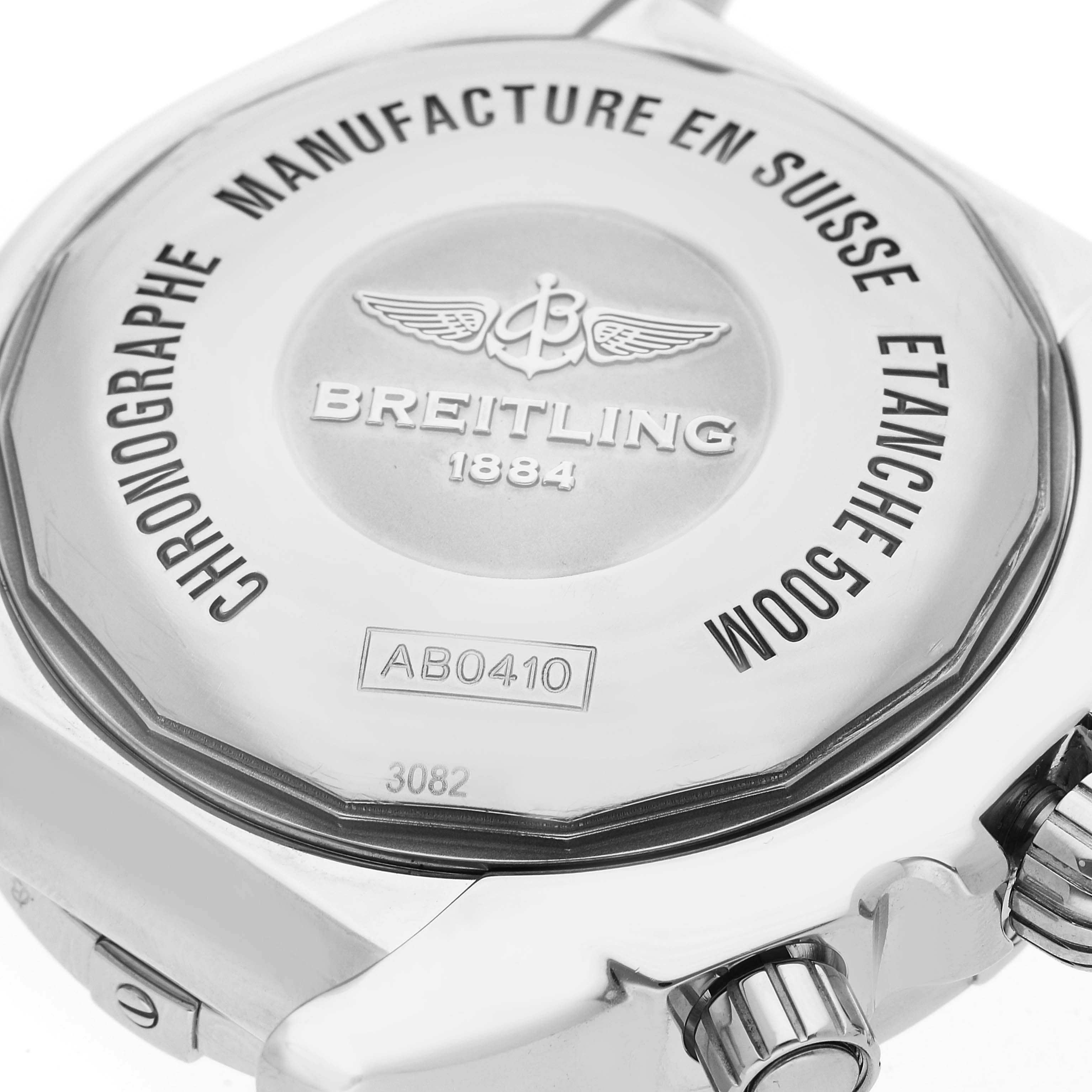 The image shows the back and side of a Breitling Chronomat AB0410 Men
s Stainless Steel Silver Dial AB0410 Men
s Stainless Steel Silver Dial watch, highlighting the case back and crown.