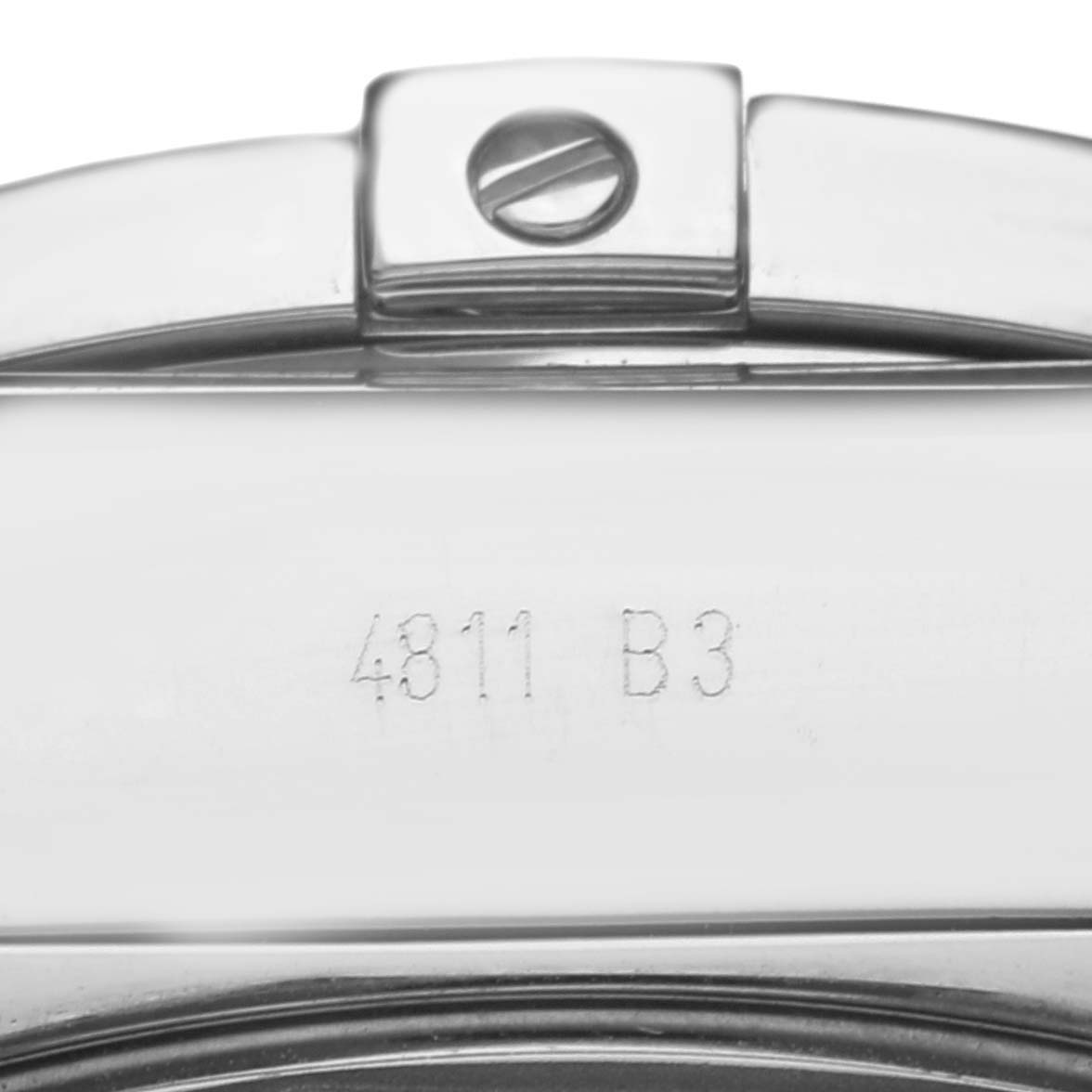The image shows a close-up view of the clasp on a Breitling Chronomat AB0410 Men
s Stainless Steel Silver Dial AB0410 Men
s Stainless Steel Silver Dial watch, highlighting the engraved serial number.