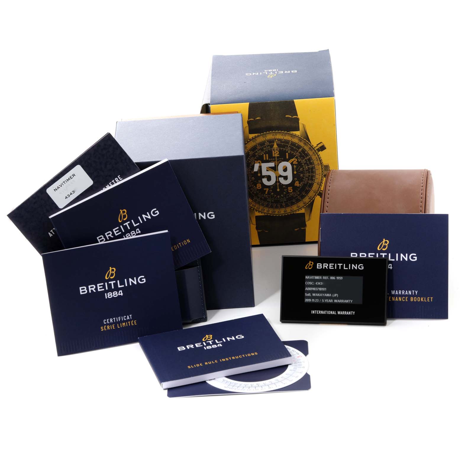 The image shows the packaging and accessories of a Breitling Navitimer AB0910371B1X1 Men's Stainless Steel Black Dial AB0910371B1X1 Men's Stainless Steel Black Dial watch, including booklets, a warranty card, and a brown leather watch case.