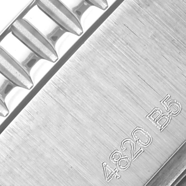 The image shows a close-up of the bracelet links and engraving on a Breitling Superocean A17367 Men's Stainless Steel Yellow Dial A17367 Men's Stainless Steel Yellow Dial watch.