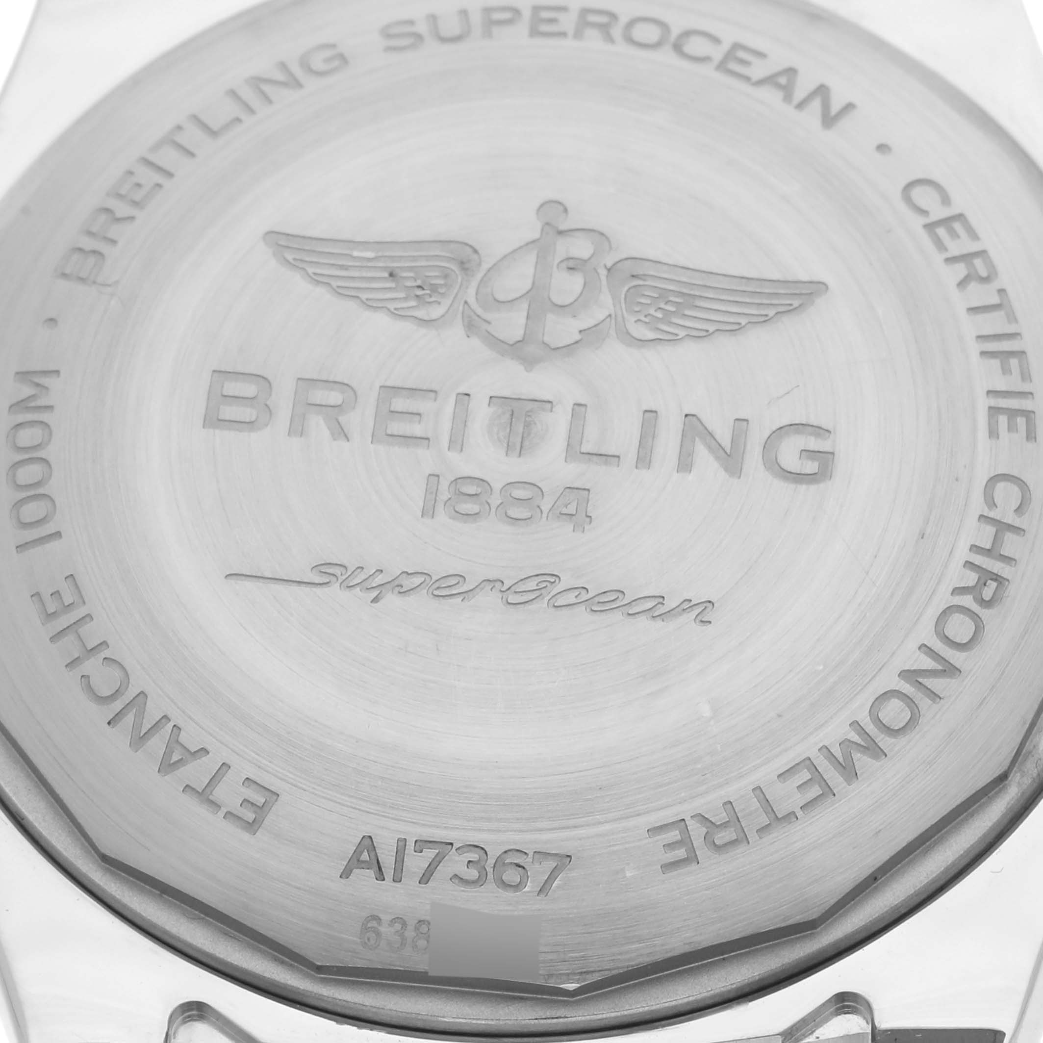 The image shows the back case of a Breitling Superocean A17367 Men's Stainless Steel Yellow Dial A17367 Men's Stainless Steel Yellow Dial watch with engraved details and branding.