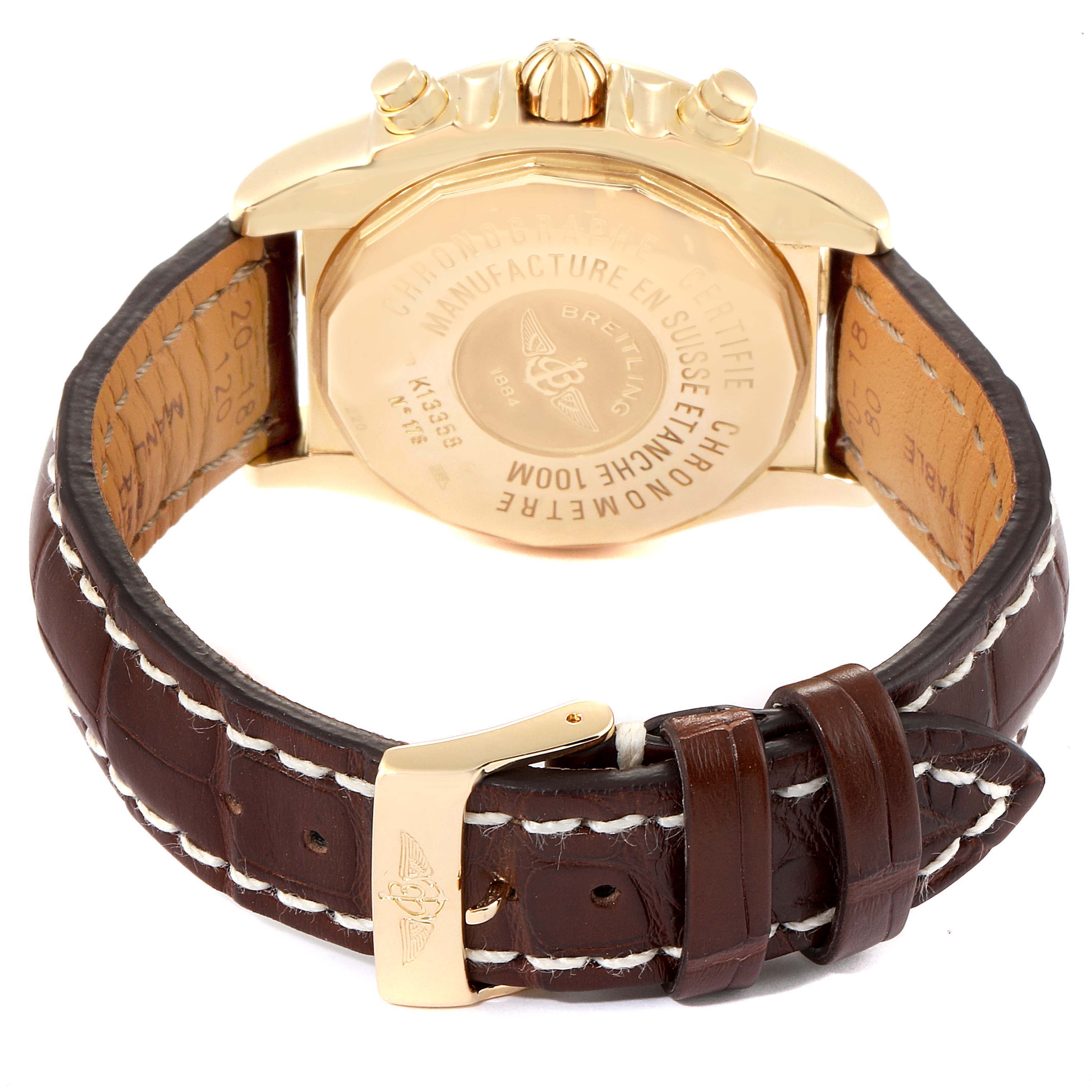 The image shows the back view of a Breitling Windrider K13358 Men's Yellow Gold Mother of Pearl Dial K13358 Men's Yellow Gold Mother of Pearl Dial watch, displaying the case back, pushers, and leather strap with buckle.