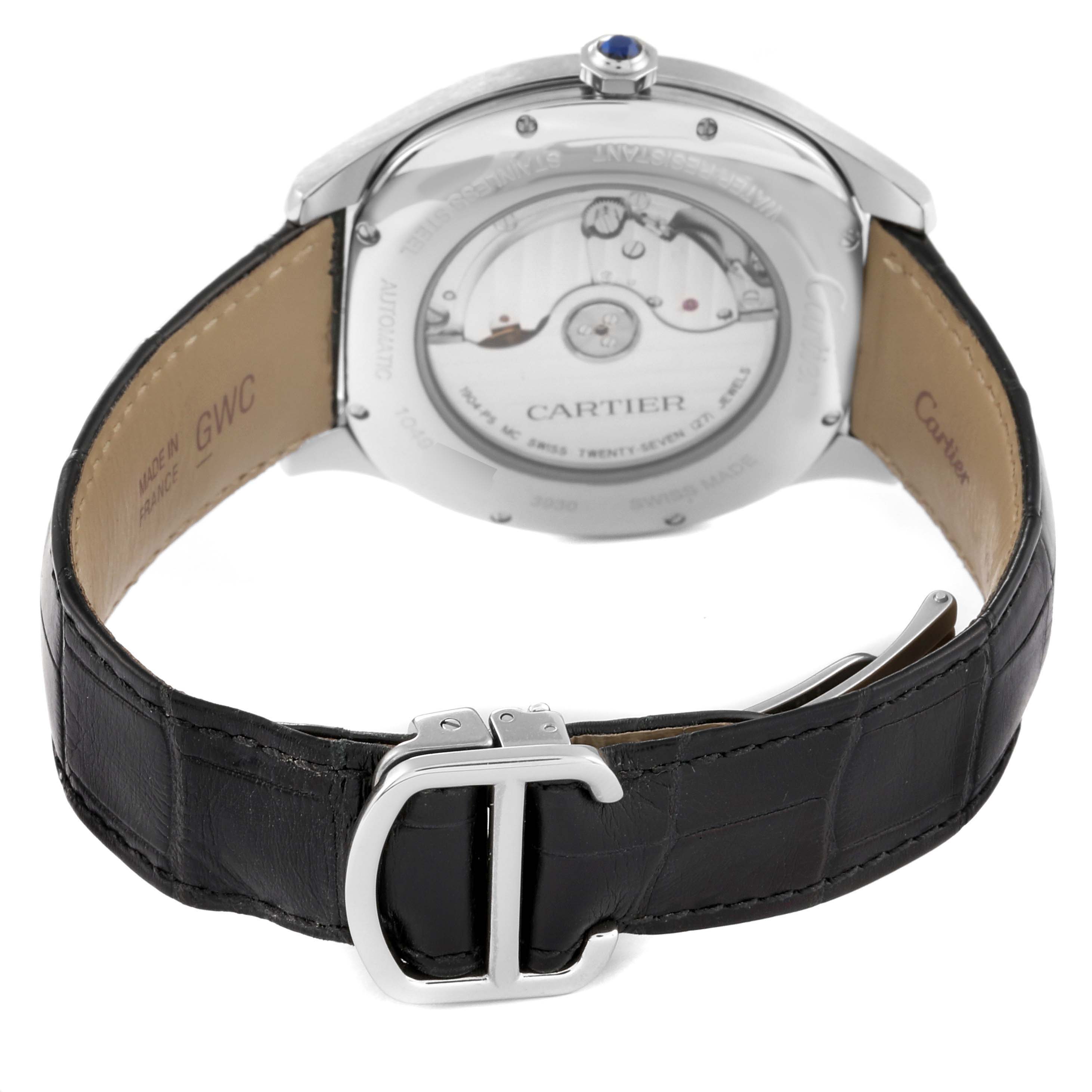 The image shows the back view of the Drive de Cartier watch by Cartier, including its movement and black leather strap with a stainless steel buckle.