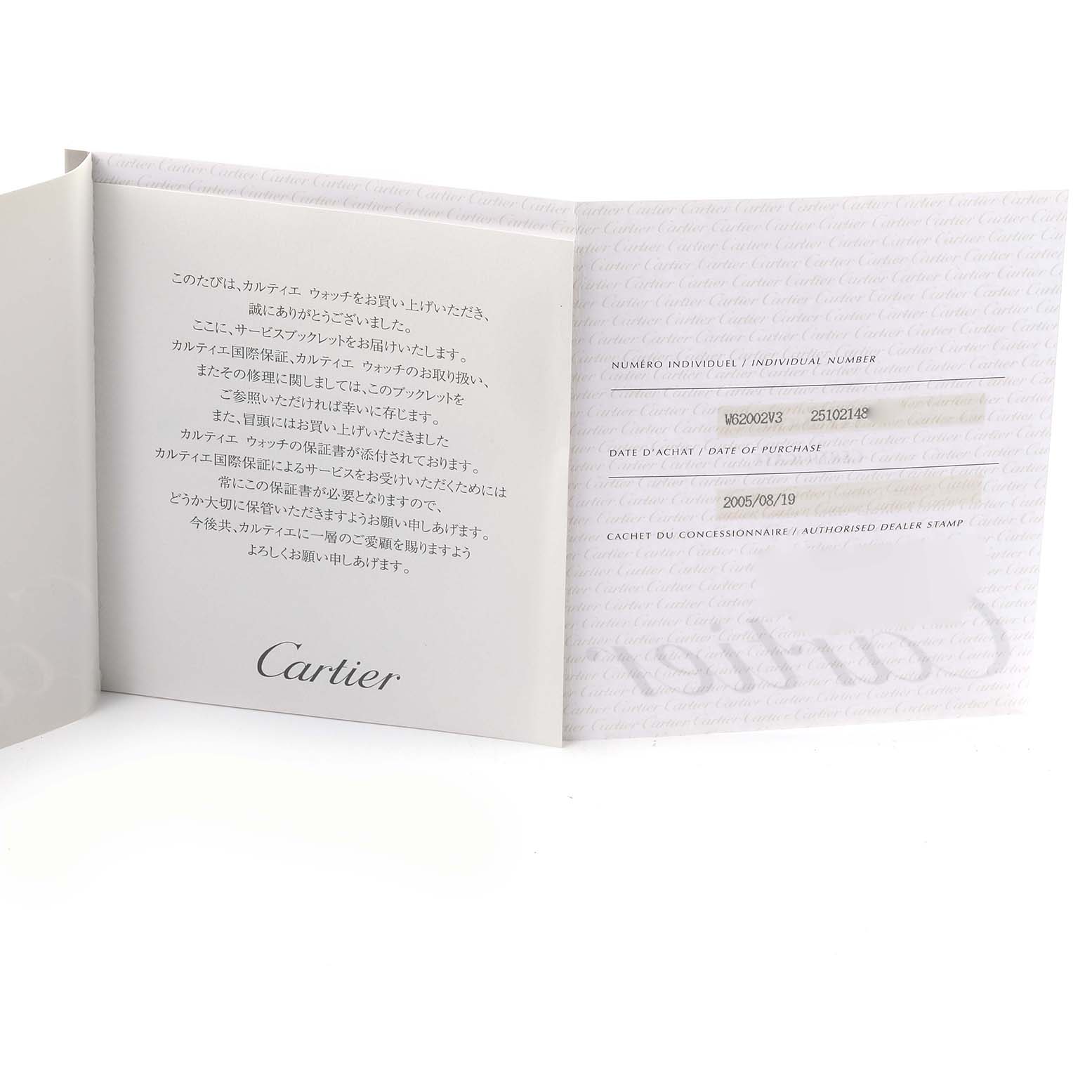 The image shows an open booklet of the Cartier Roadster W62002V3 Men's Stainless Steel Black Dial W62002V3 Men's Stainless Steel Black Dial watch, displaying information and purchase details.