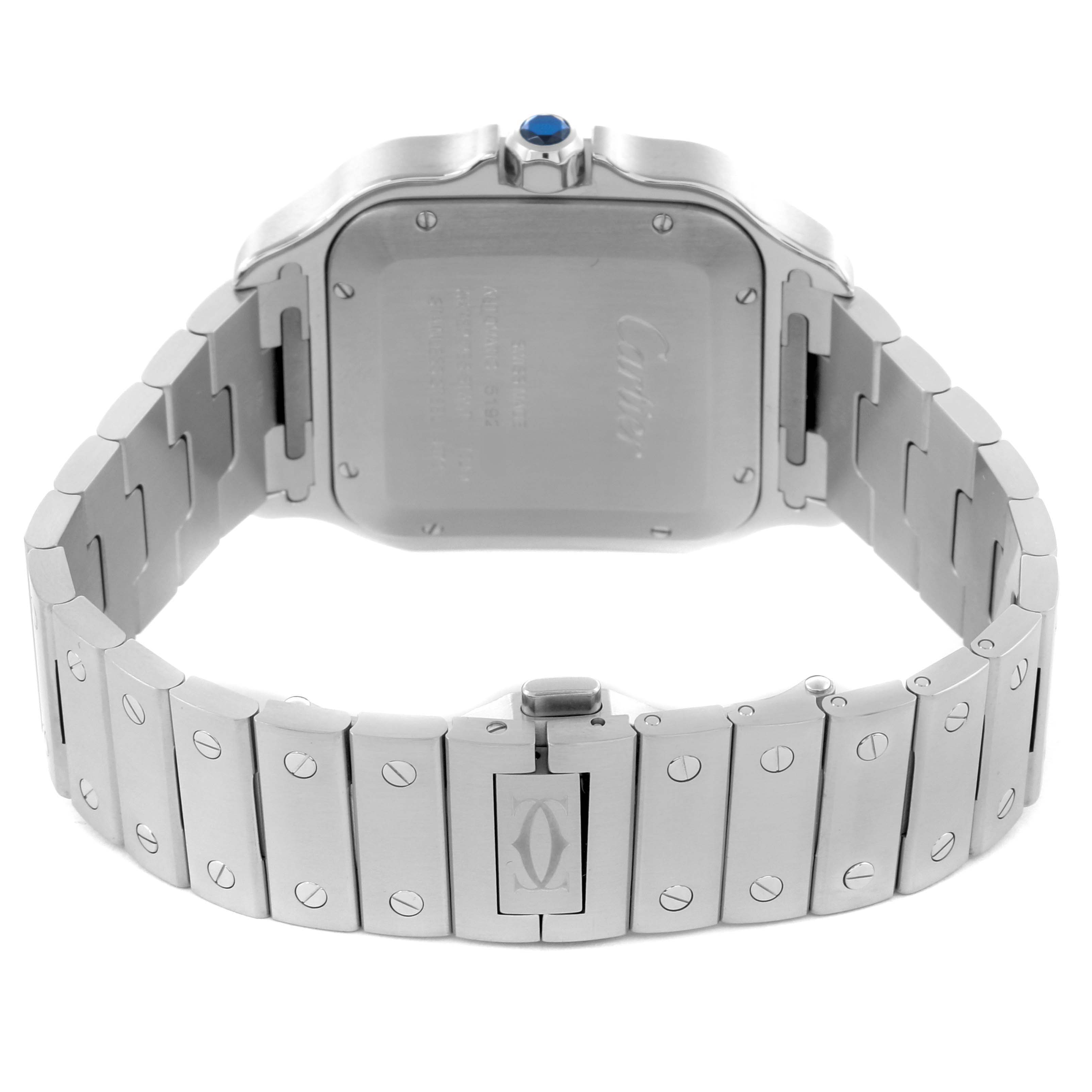The image shows the Cartier Santos WSSA0030 Men's Stainless Steel Blue Dial WSSA0030 Men's Stainless Steel Blue Dial watch from the back, highlighting the case back, bracelet, and crown with a blue cabochon.