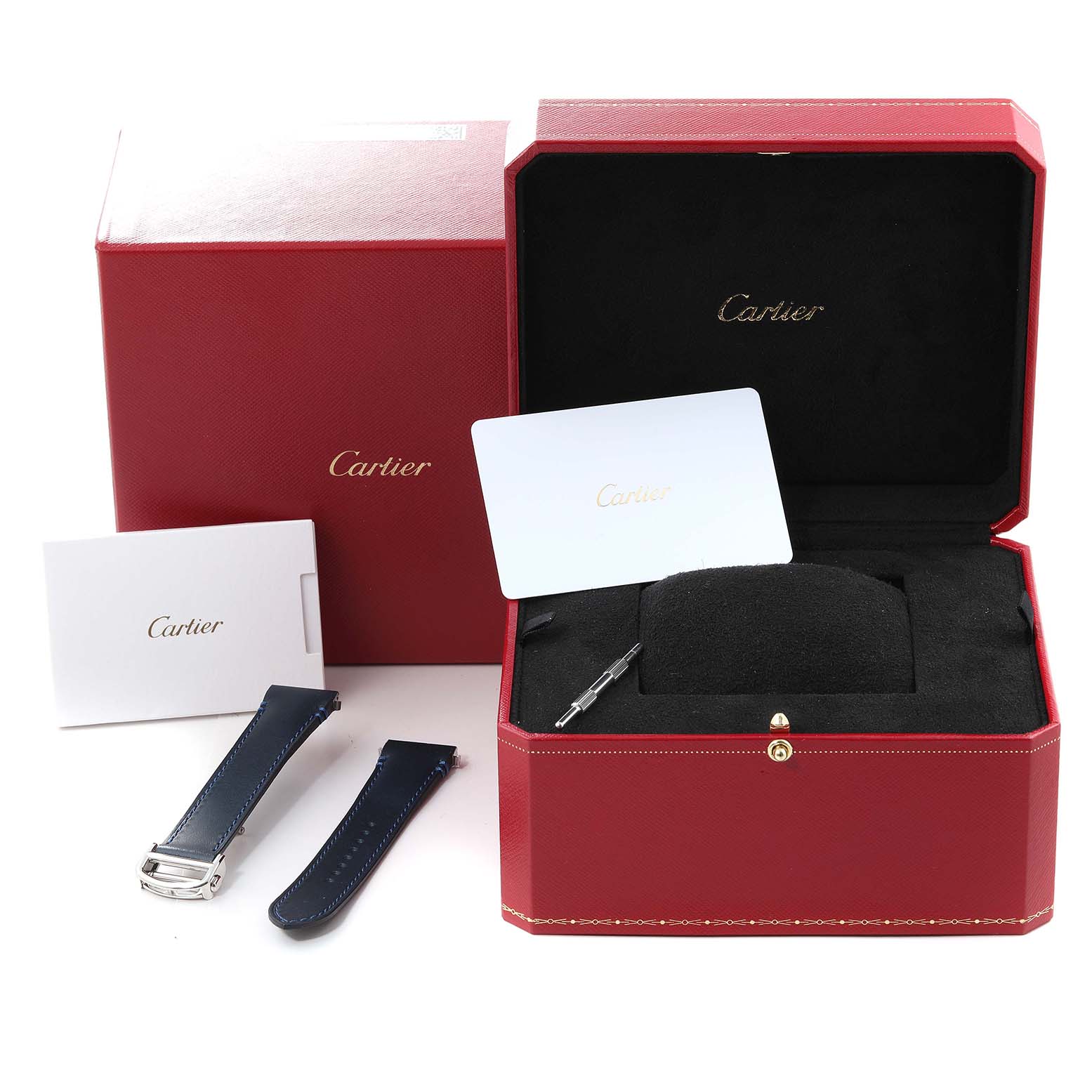 This image shows a Cartier Santos WSSA0047 Men
s Stainless Steel Silver Dial WSSA0047 Men
s Stainless Steel Silver Dial watch box with additional straps, documentation, and a tool.