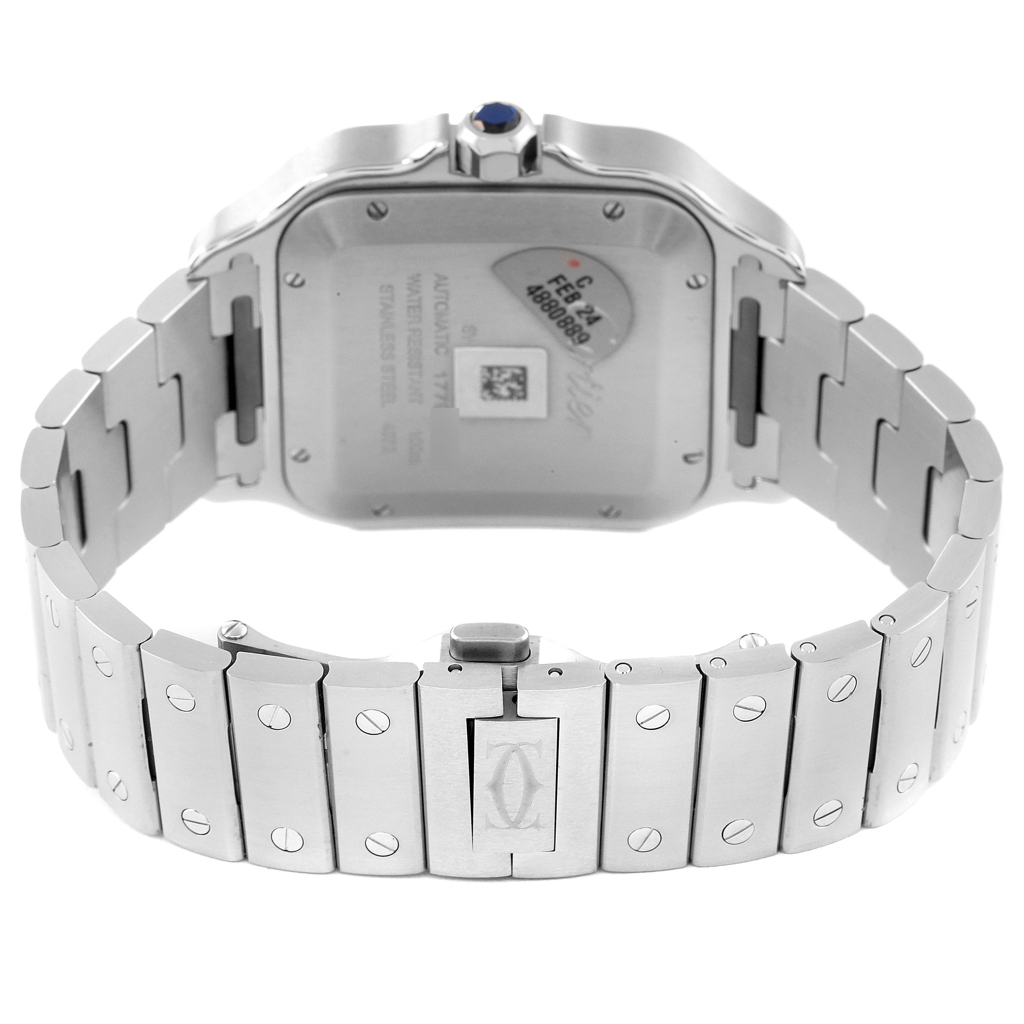 The image shows the back view of the Cartier Santos WSSA0018 Men
s Stainless Steel Silver Dial WSSA0018 Men
s Stainless Steel Silver Dial watch, including the case back and metal bracelet.