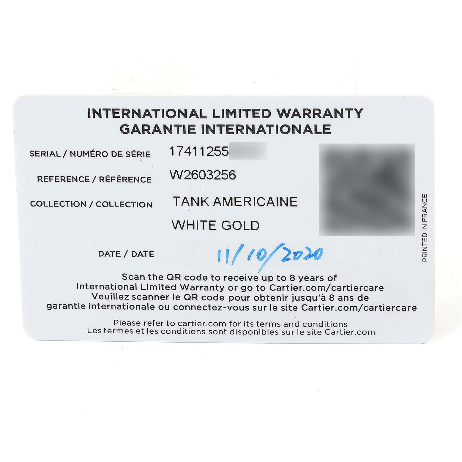 The image shows the front side of an International Limited Warranty card for the Cartier Tank Americaine W2603256 Men's White Gold Silver Dial W2603256 Men's White Gold Silver Dial watch model.