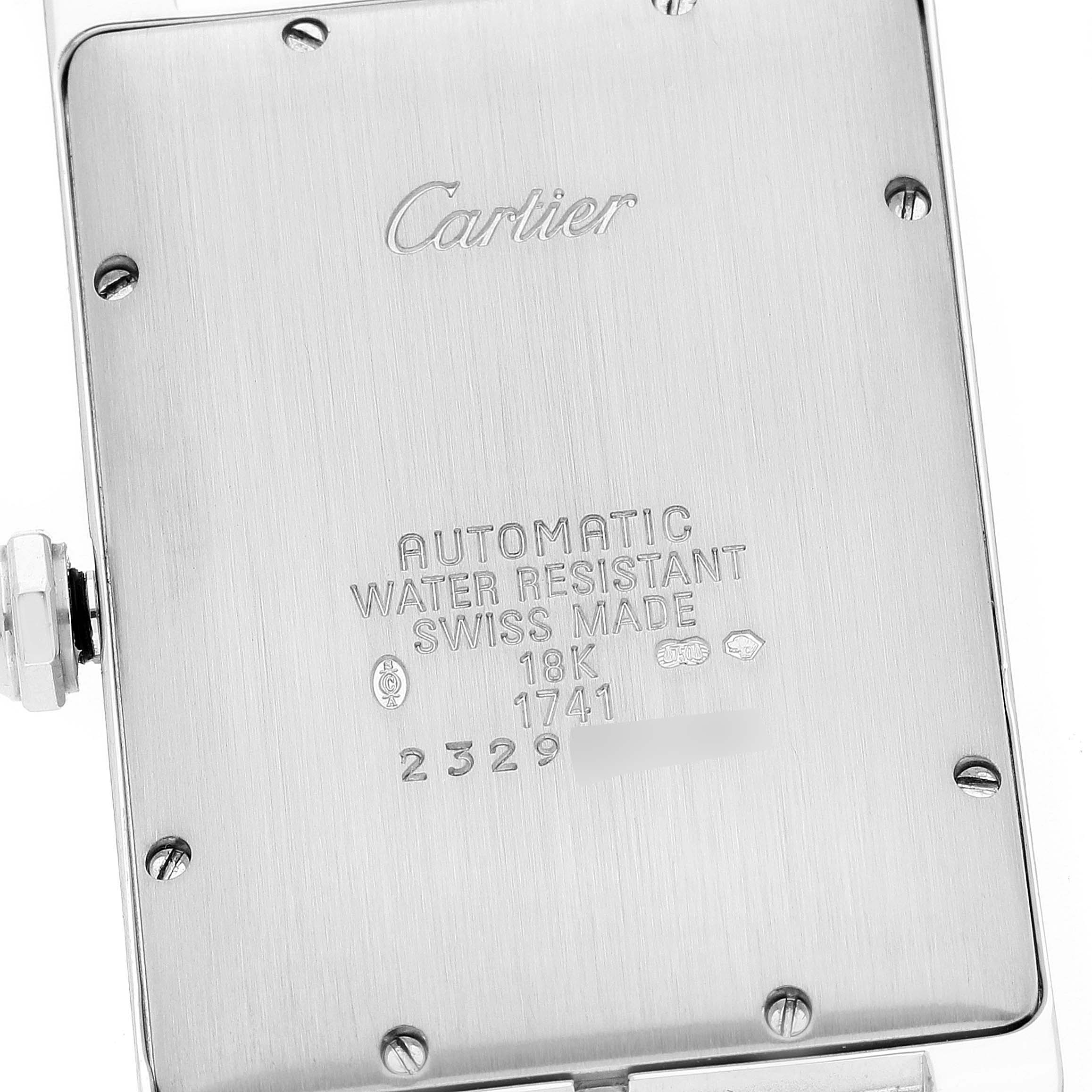 The image shows the back case of a Cartier Tank Américaine watch.