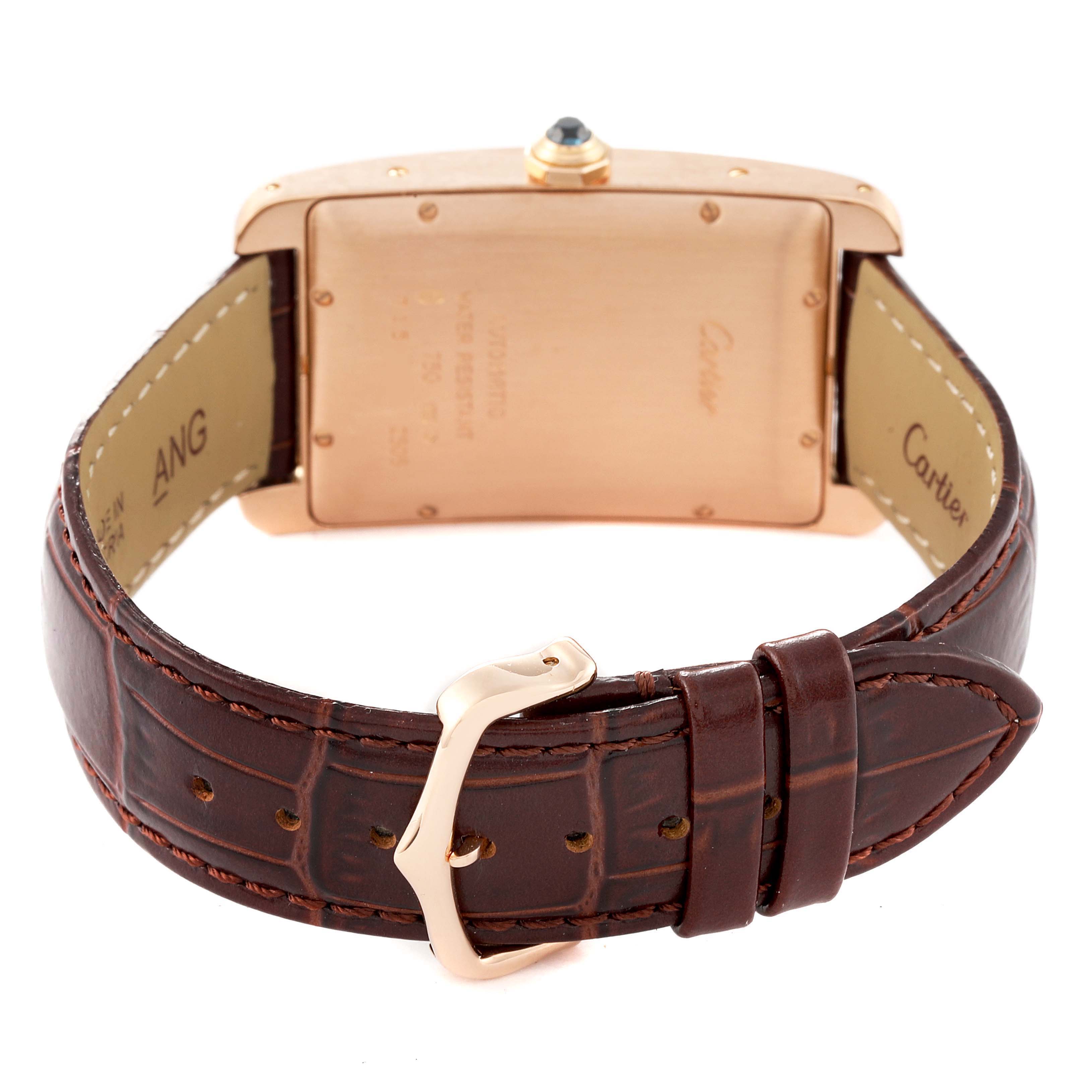 The image shows the back of a Cartier Tank Americaine W2609156 Men
s Rose Gold Silver Dial W2609156 Men
s Rose Gold Silver Dial watch, highlighting the case, crown, and leather strap with buckle.
