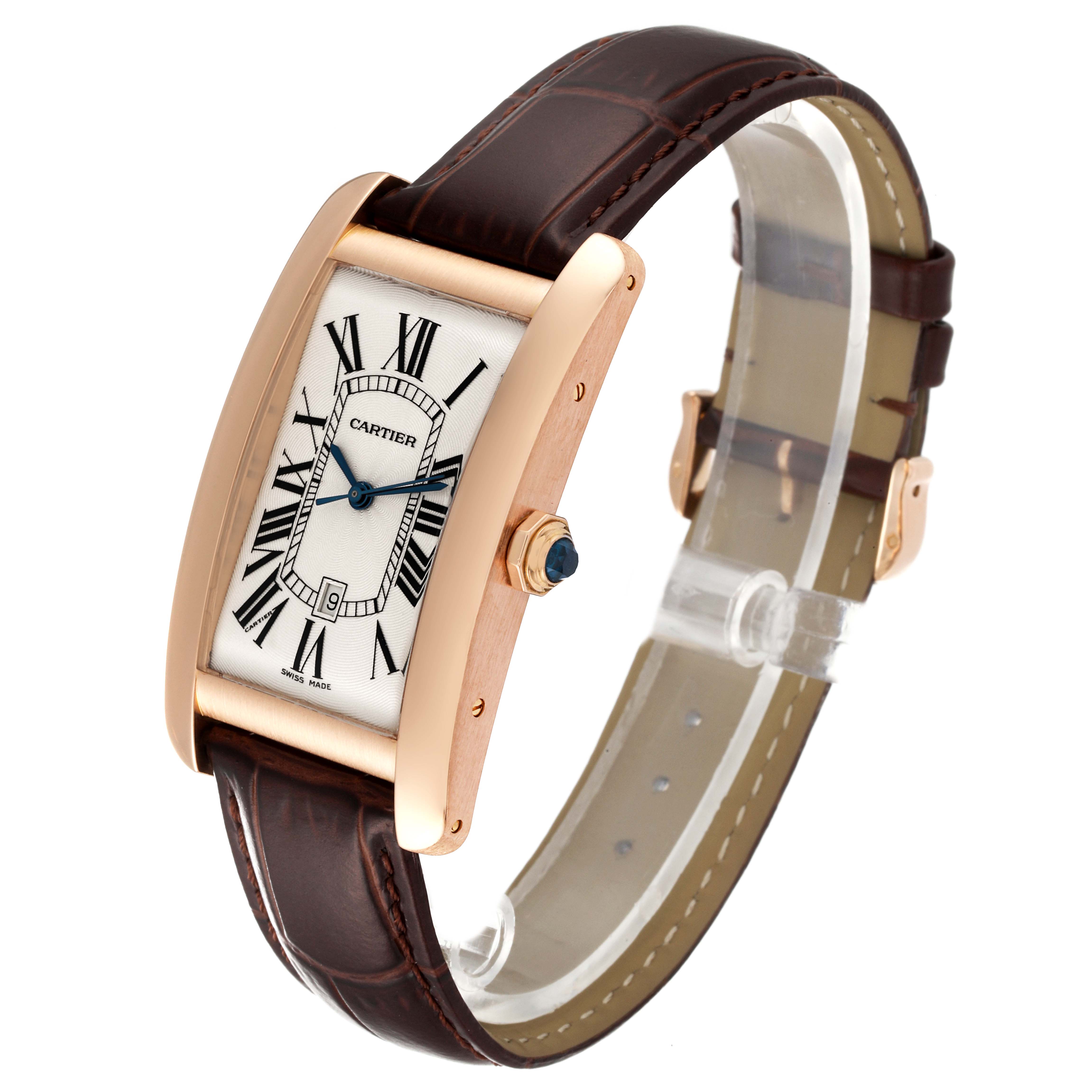 The image shows a side angle of a Cartier Tank Americaine W2609156 Men
s Rose Gold Silver Dial W2609156 Men
s Rose Gold Silver Dial watch, highlighting the brown leather strap, gold case, and Roman numeral dial.