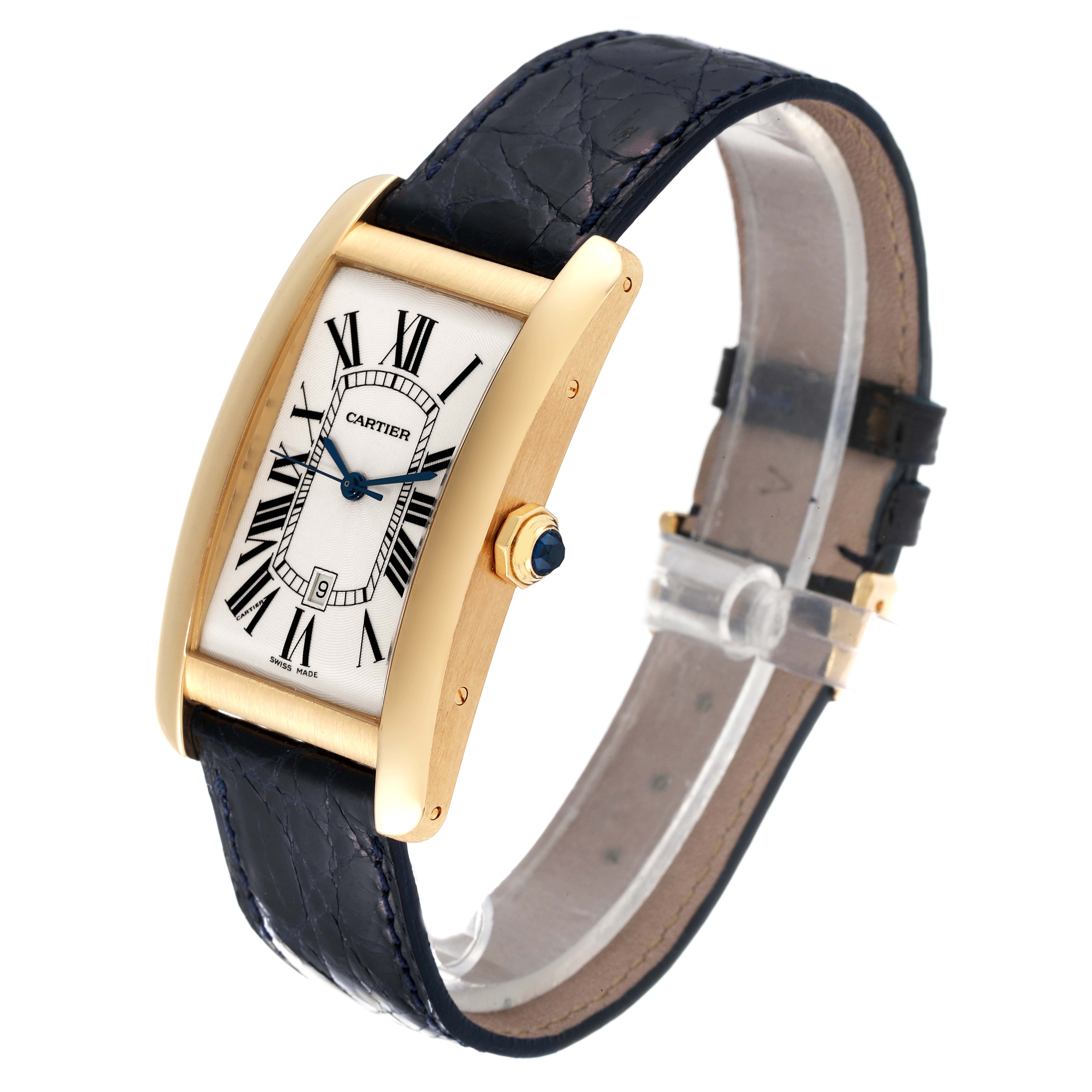 This image shows a Cartier Tank Americaine W2603156 Men's Yellow Gold Silver Dial W2603156 Men's Yellow Gold Silver Dial watch at a slight angle, highlighting its rectangular face, gold case, and black leather strap.
