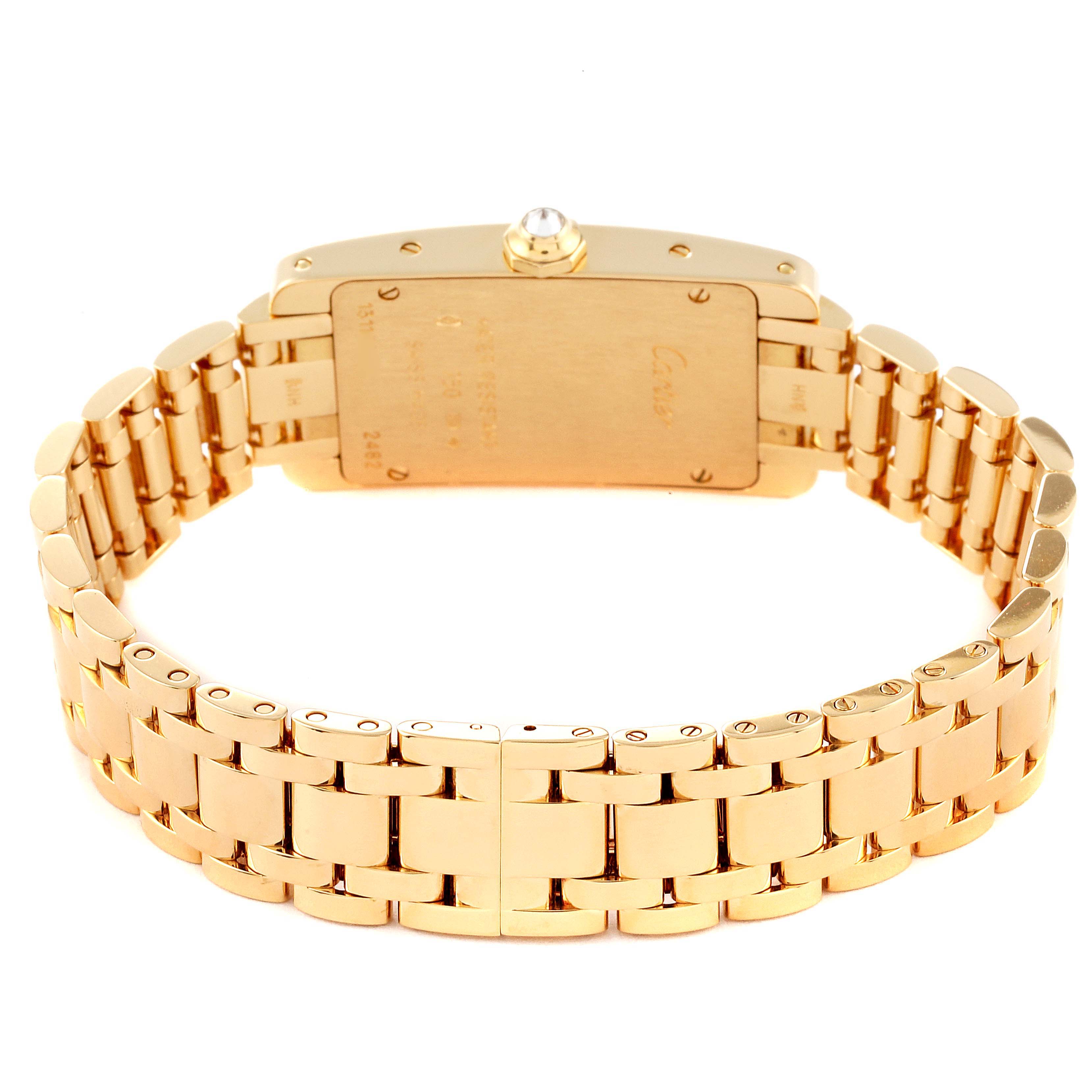 The Cartier Tank Americaine WB7072K2 Women's Yellow Gold Silver Dial WB7072K2 Women's Yellow Gold Silver Dial watch is shown from the back, highlighting its gold case and bracelet.